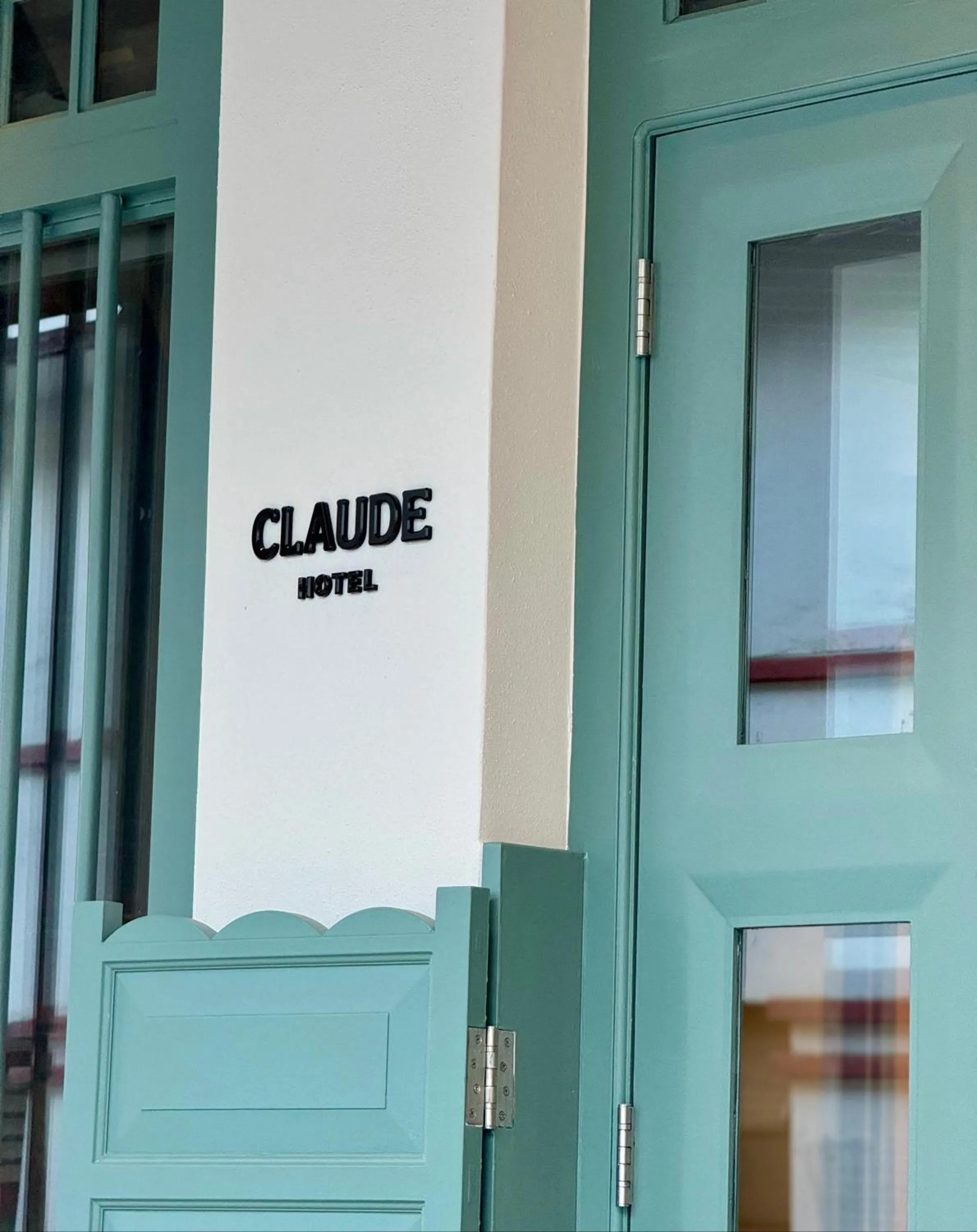Property logo or sign in Claude Hotel