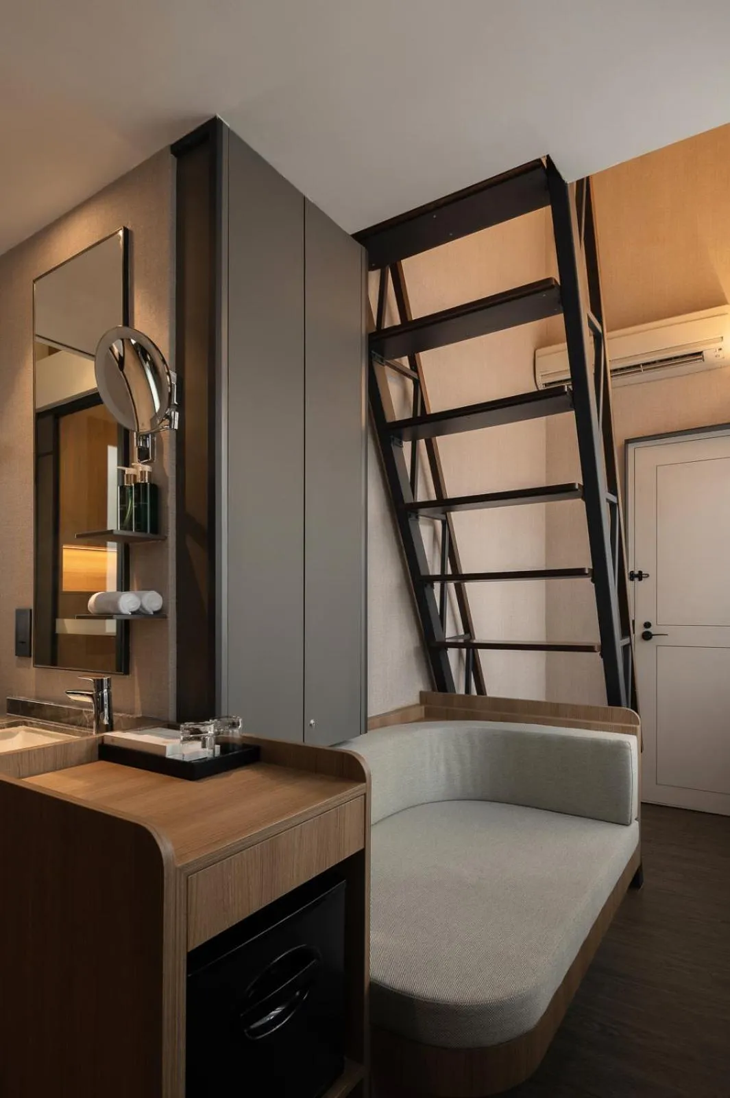 Bed in Claude Hotel