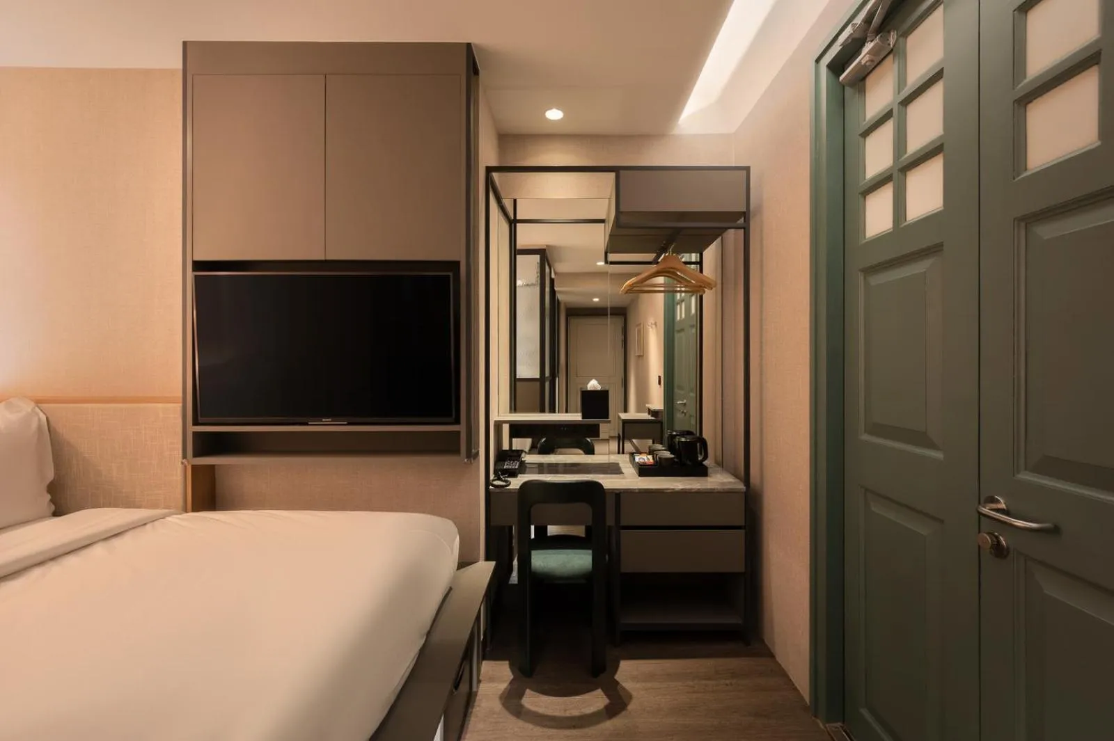Bed in Claude Hotel