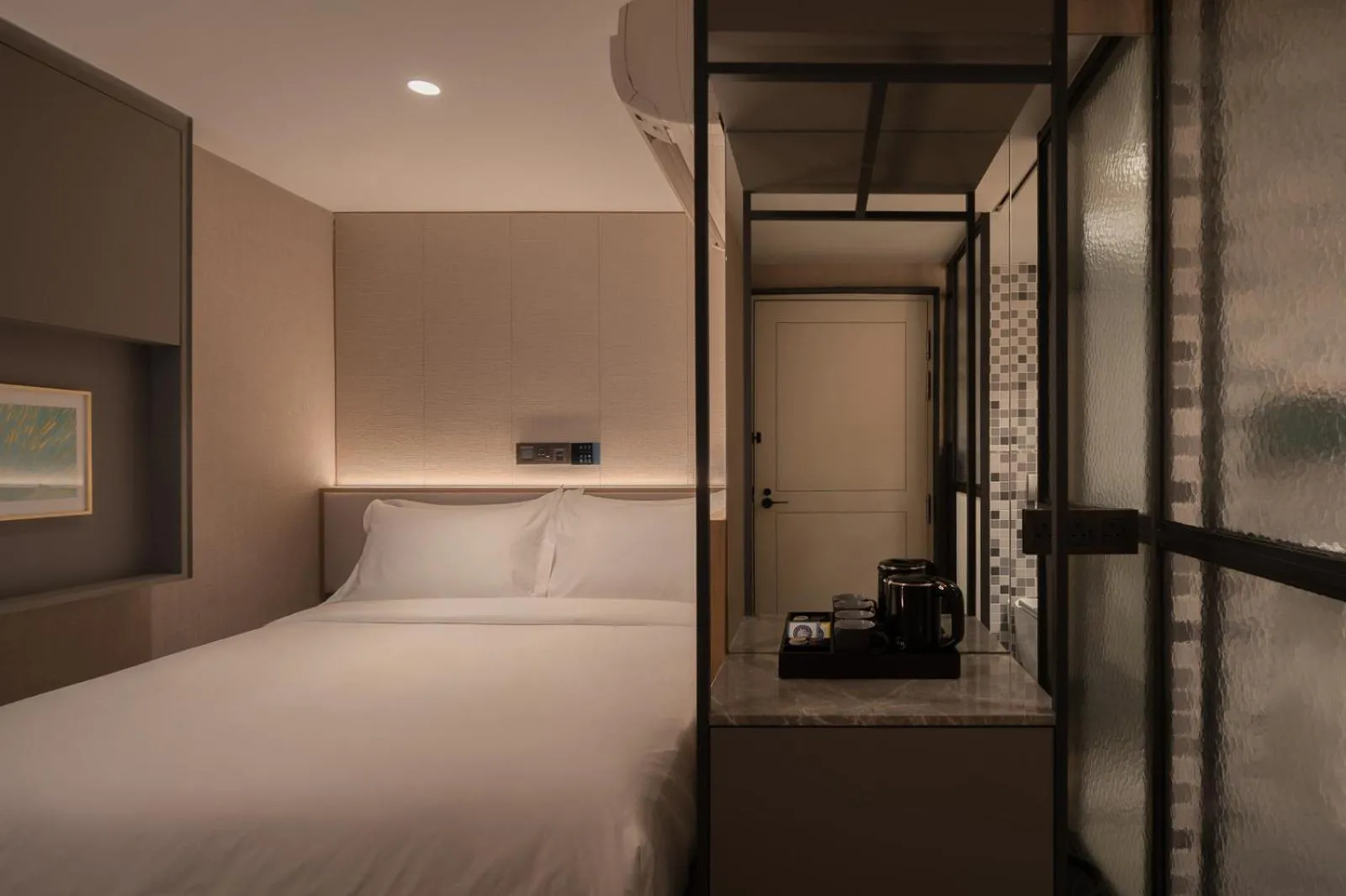 Bed in Claude Hotel