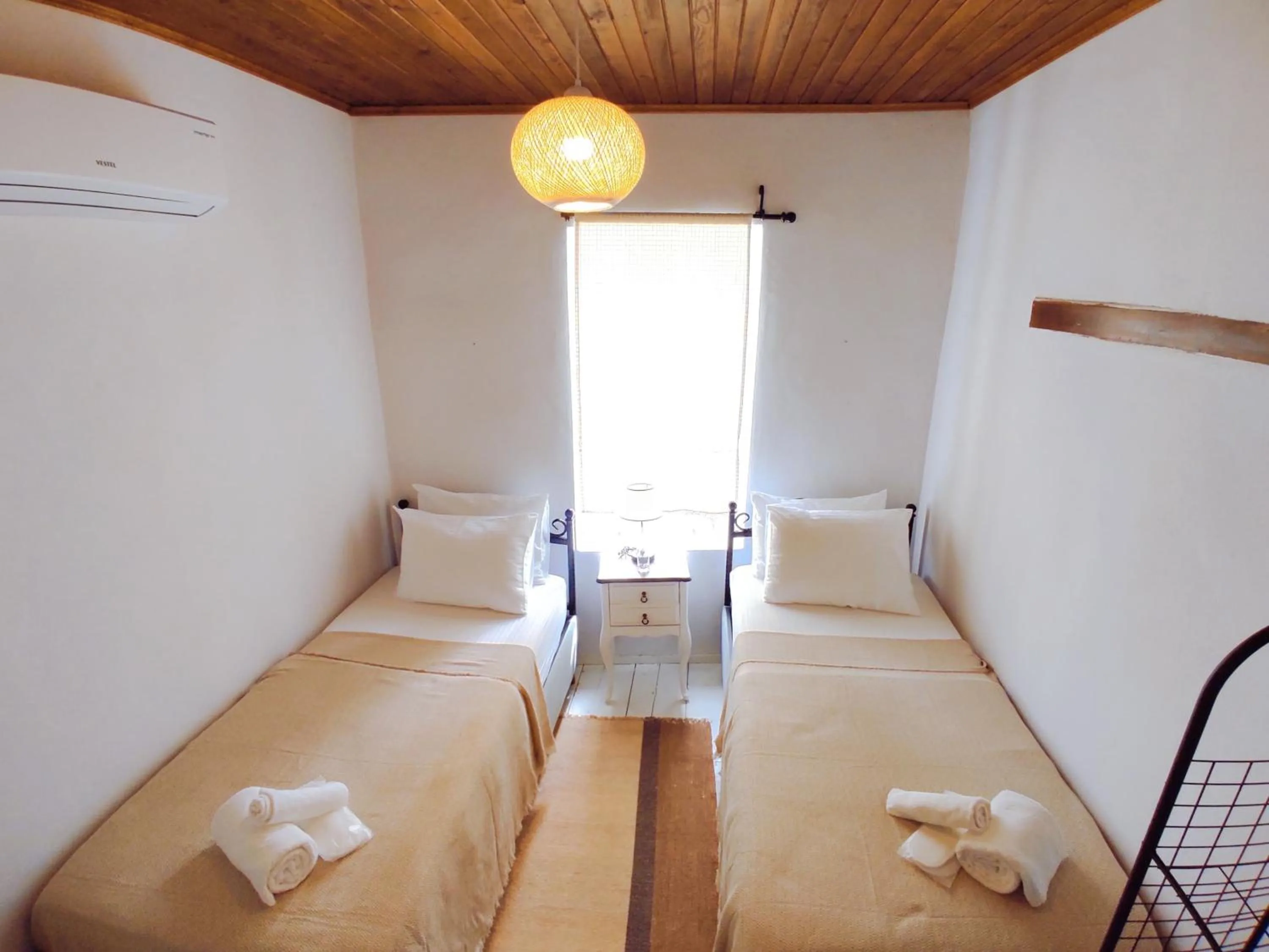 Bed in Kidoni Macaron Guesthouse