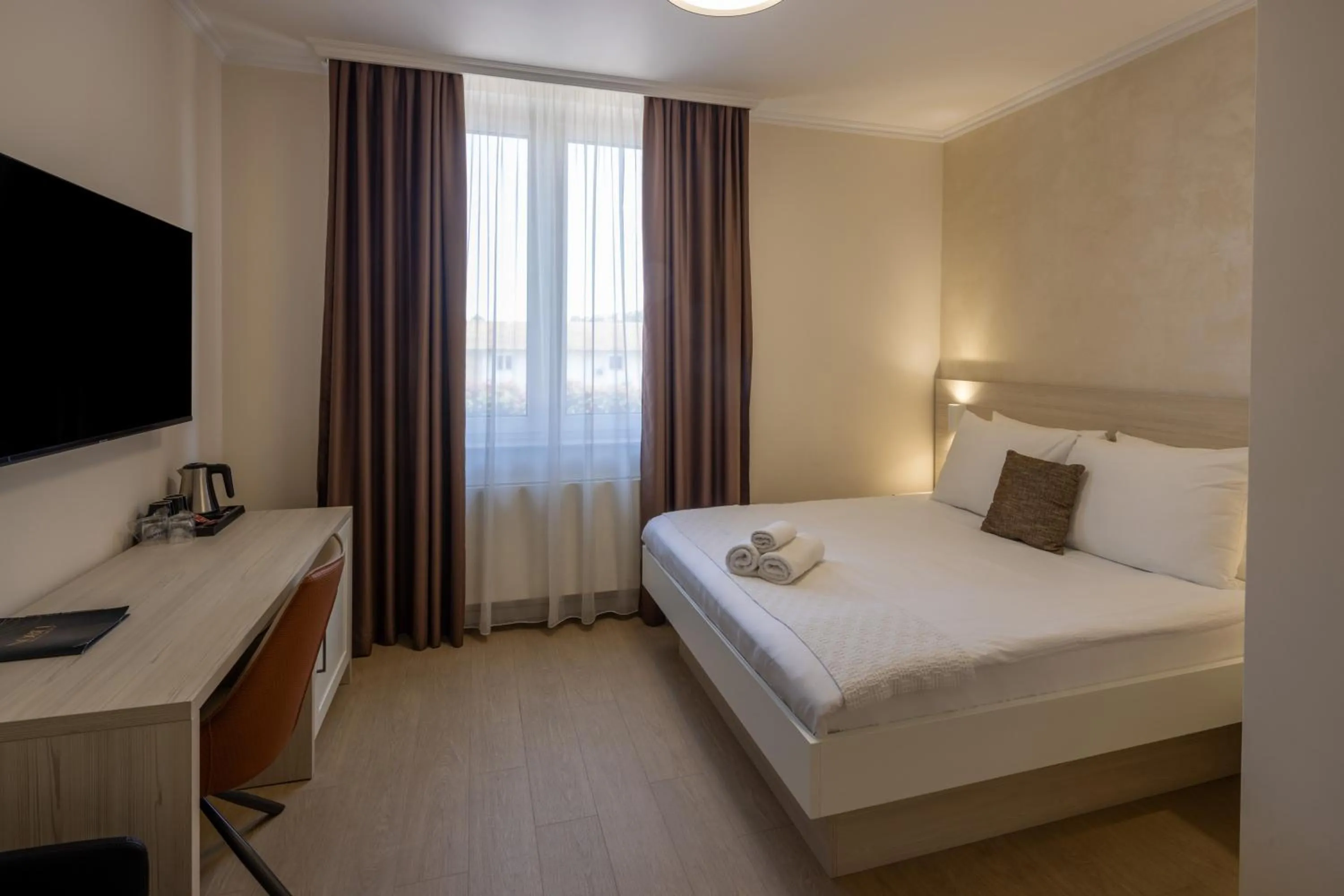 Bed in Nobel West Hotel