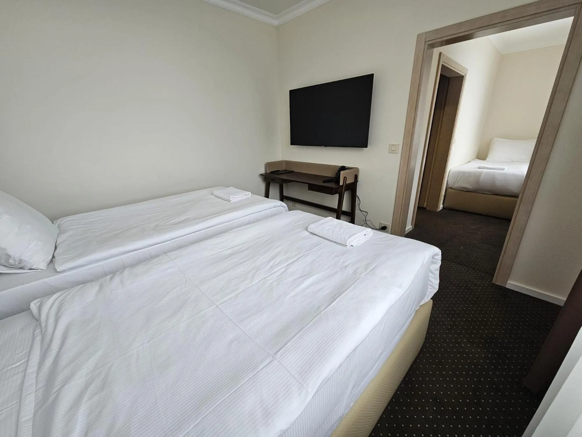 Bed in Nobel West Hotel