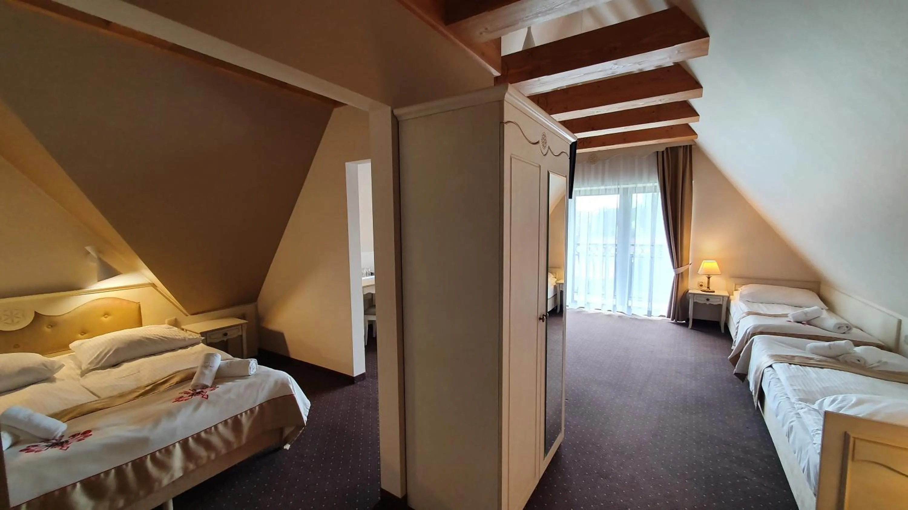 Bed in Carlina Hotel & SPA