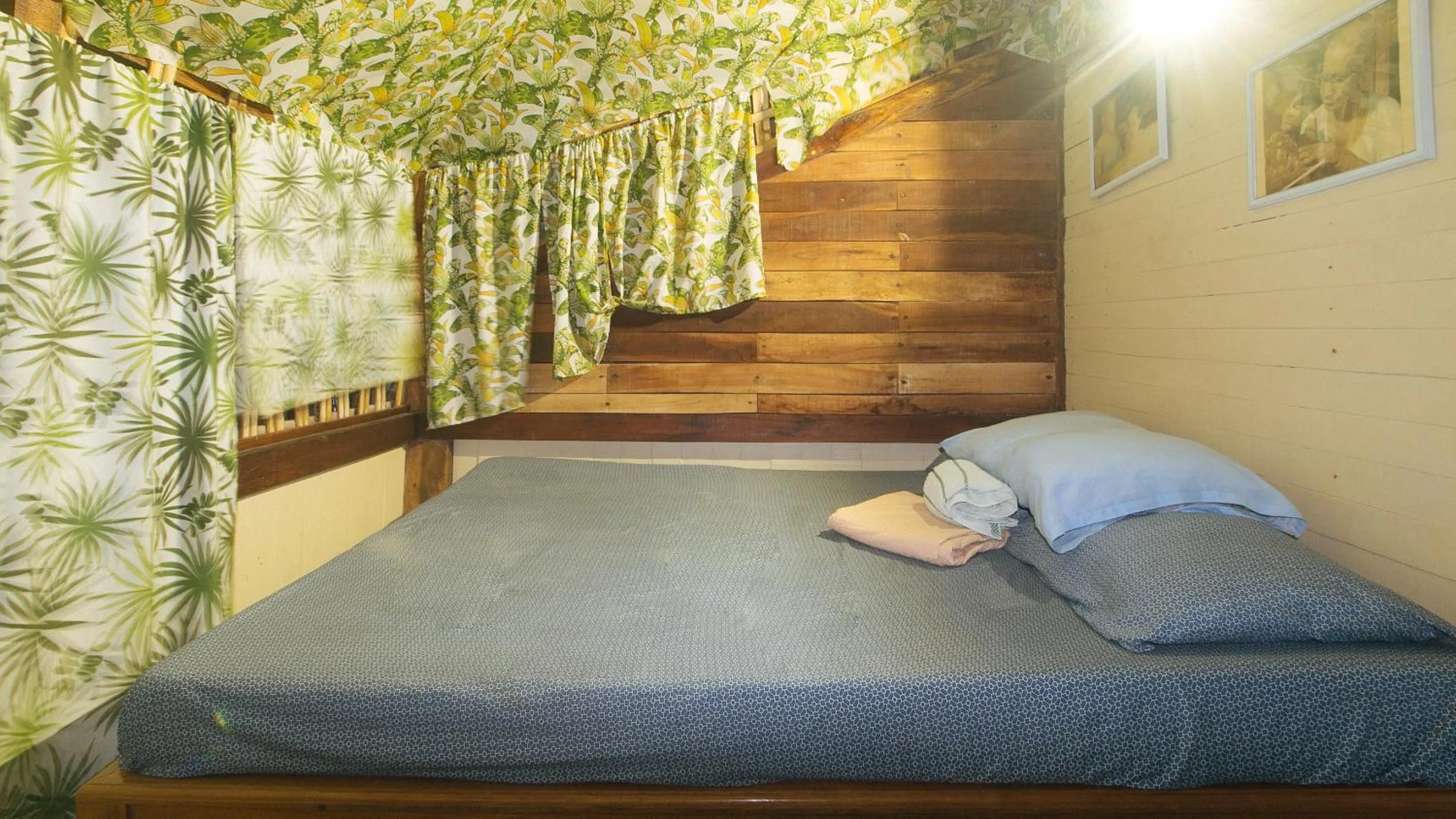 Bed in The Clara Beach and Guest House