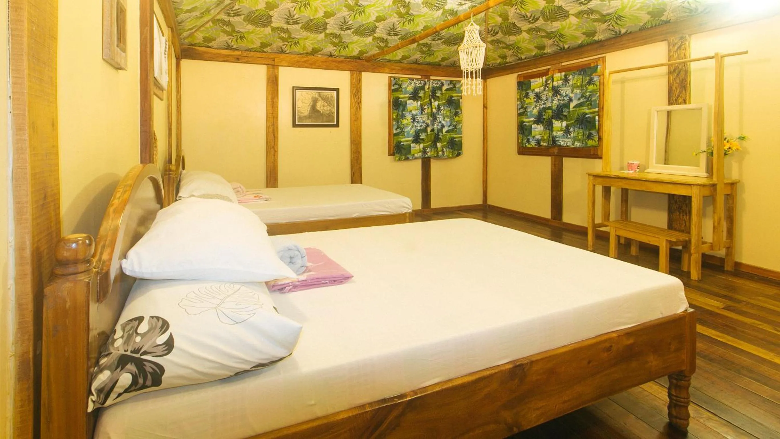 Bed in The Clara Beach and Guest House