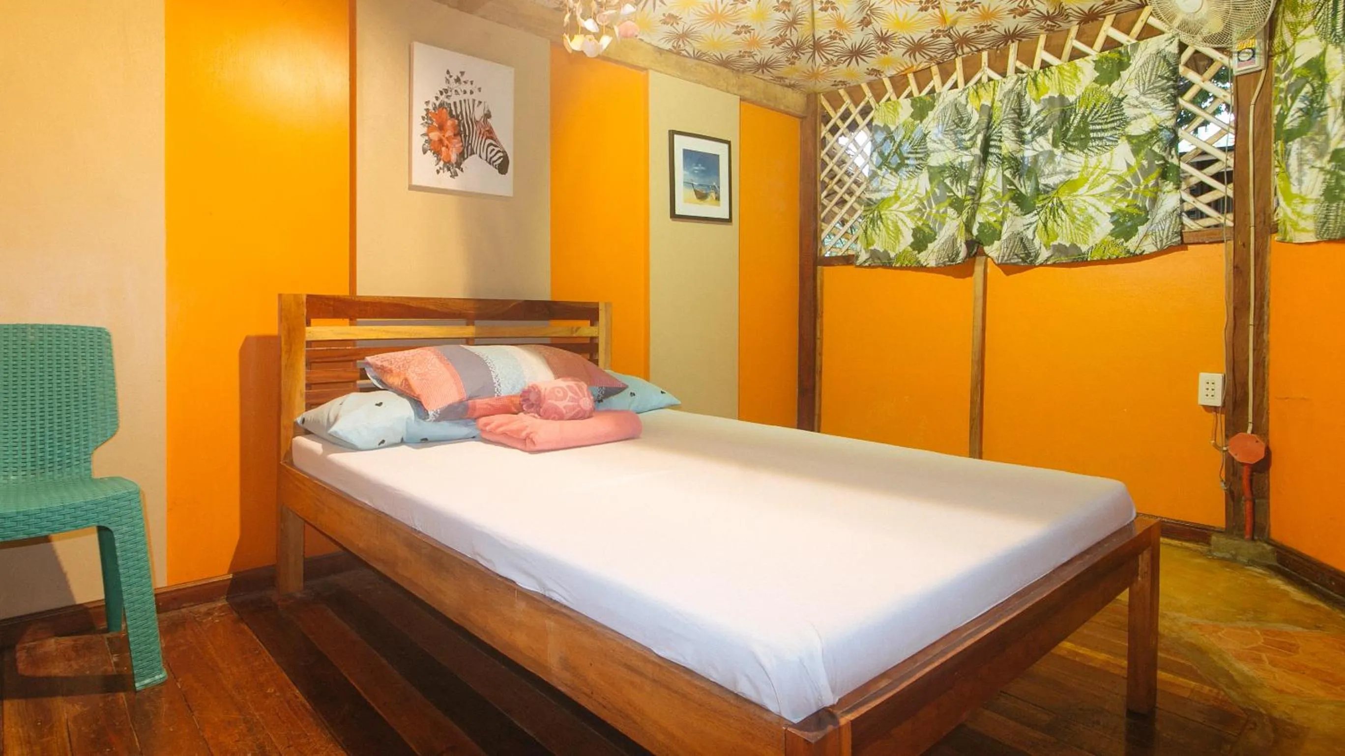 Bed in The Clara Beach and Guest House