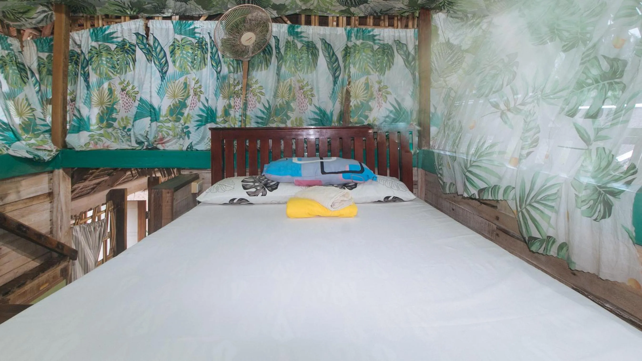 Bed in The Clara Beach and Guest House