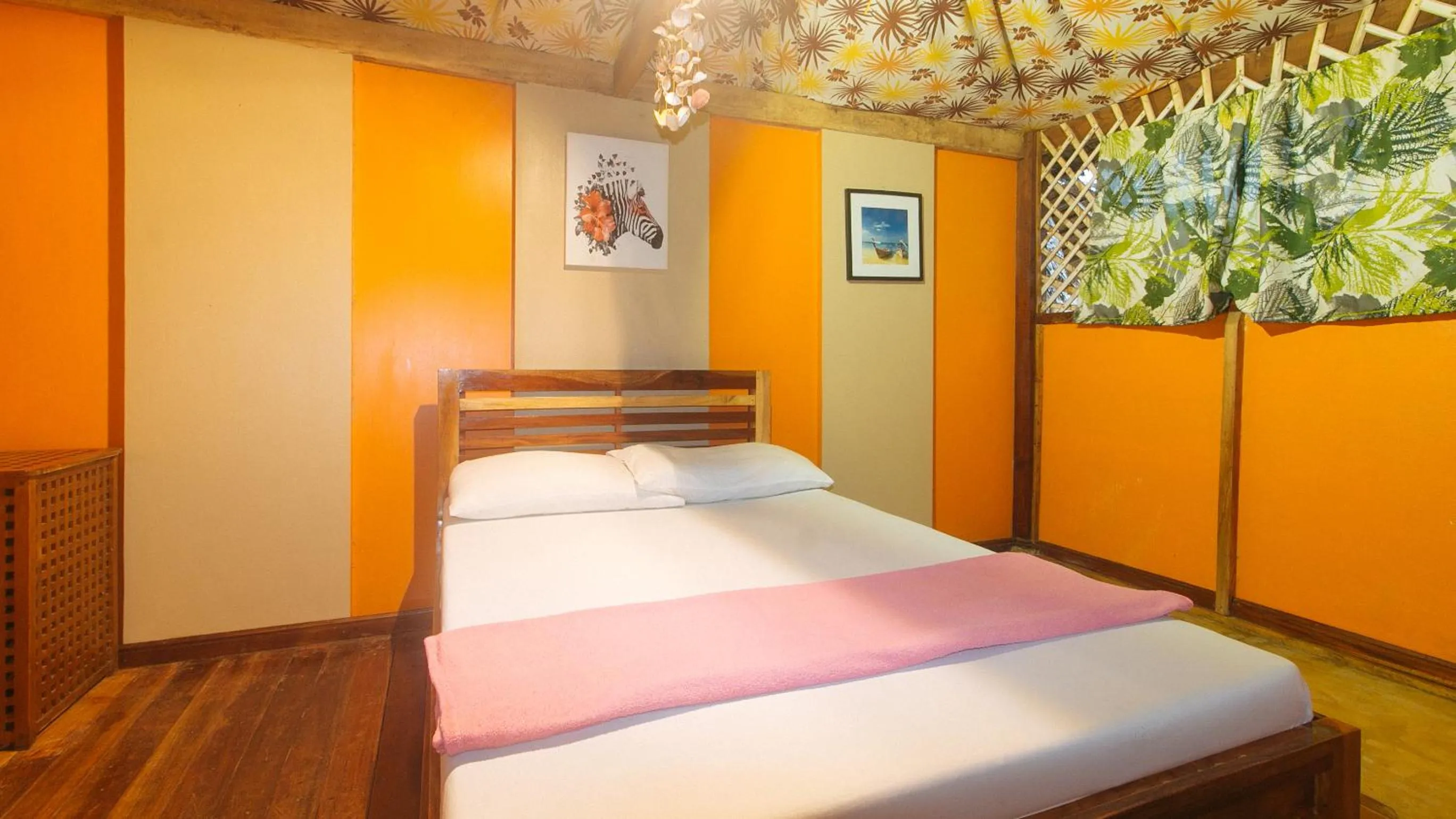 Bed in The Clara Beach and Guest House