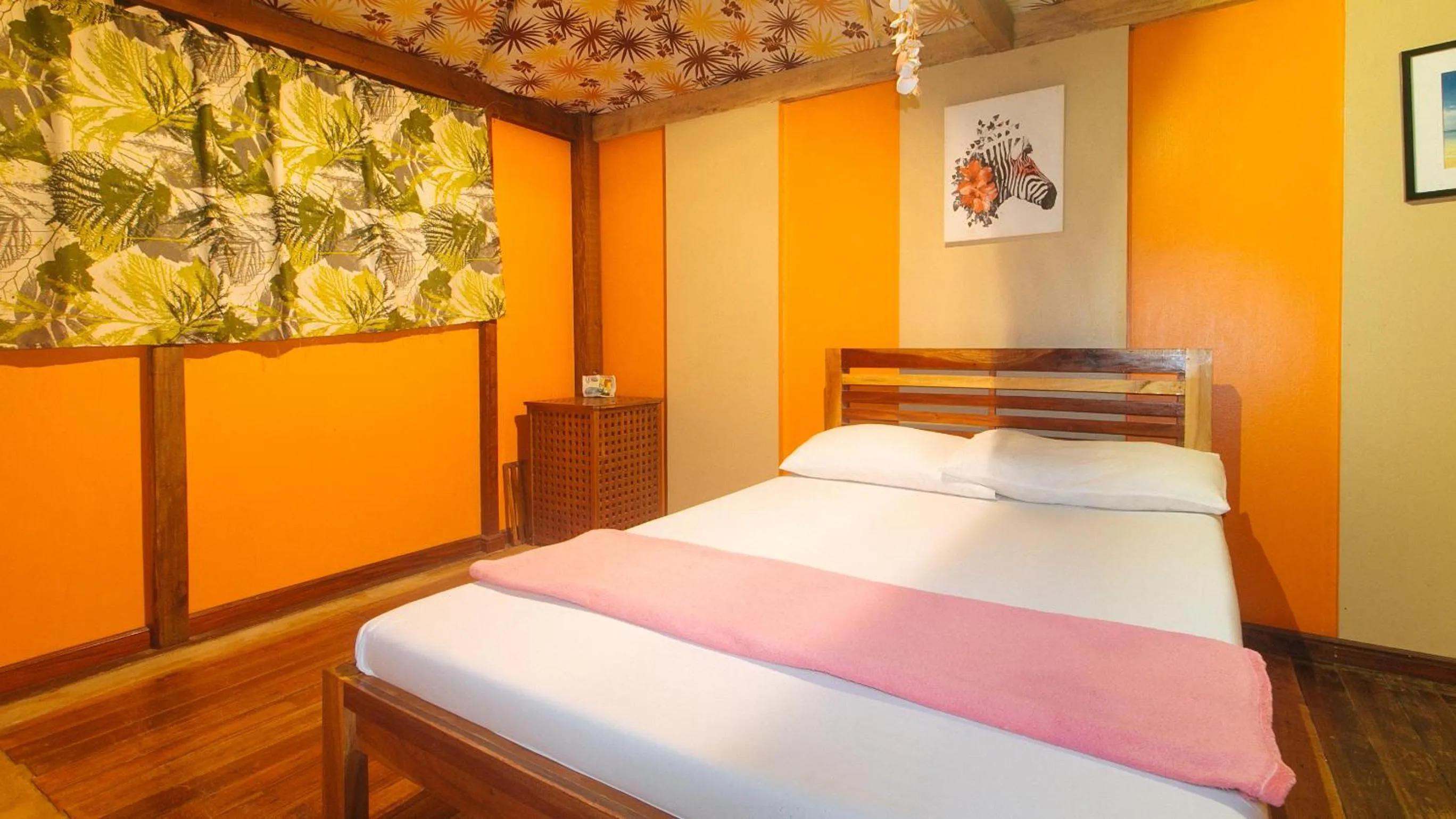 Bed in The Clara Beach and Guest House