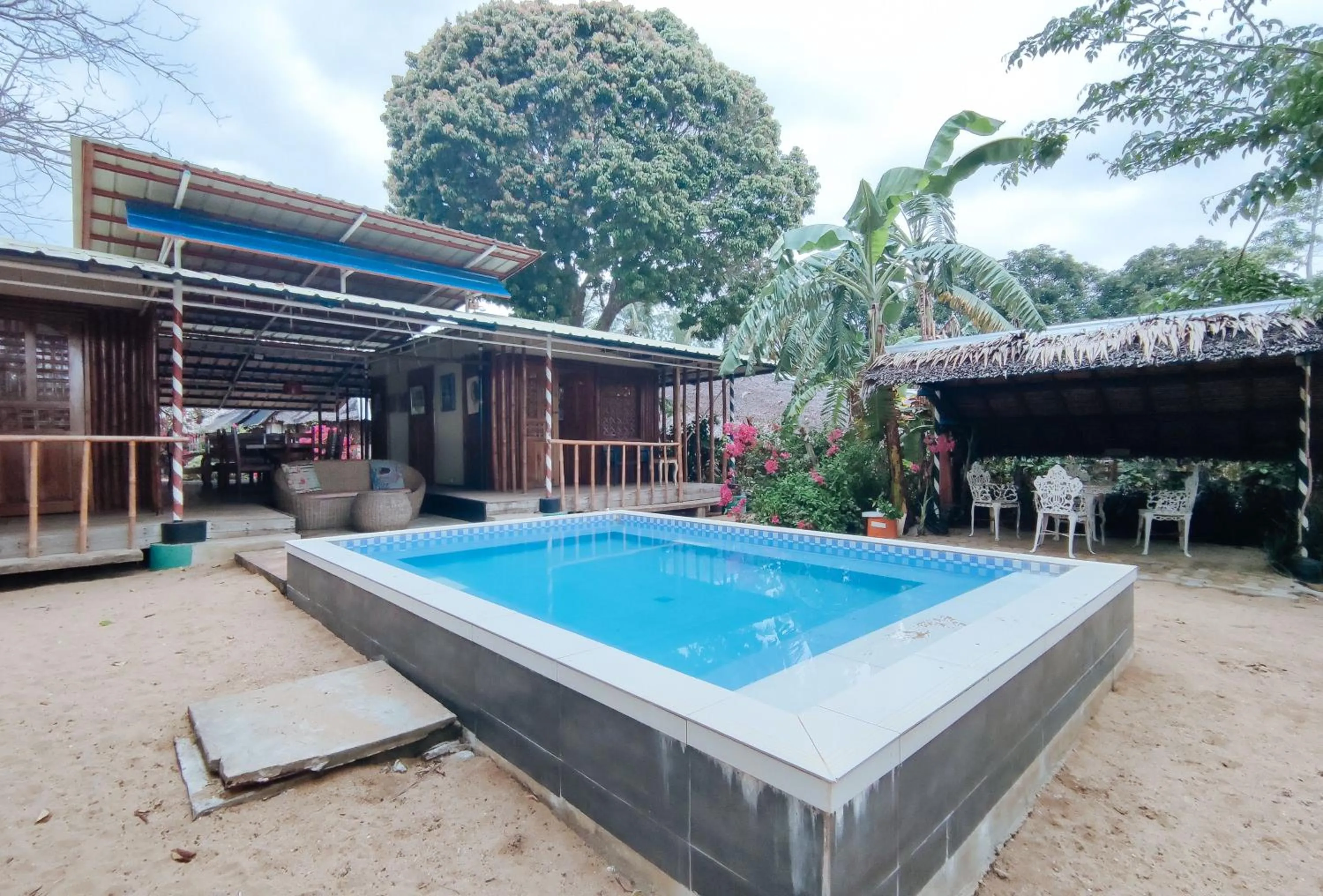 Swimming pool in The Clara Beach and Guest House