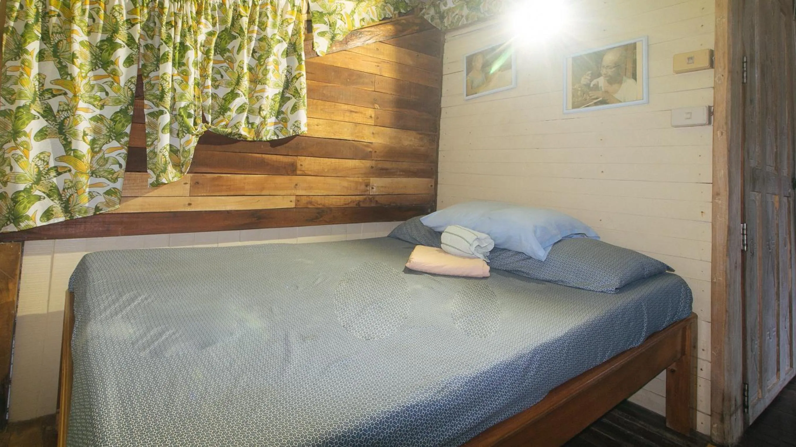 Bed in The Clara Beach and Guest House