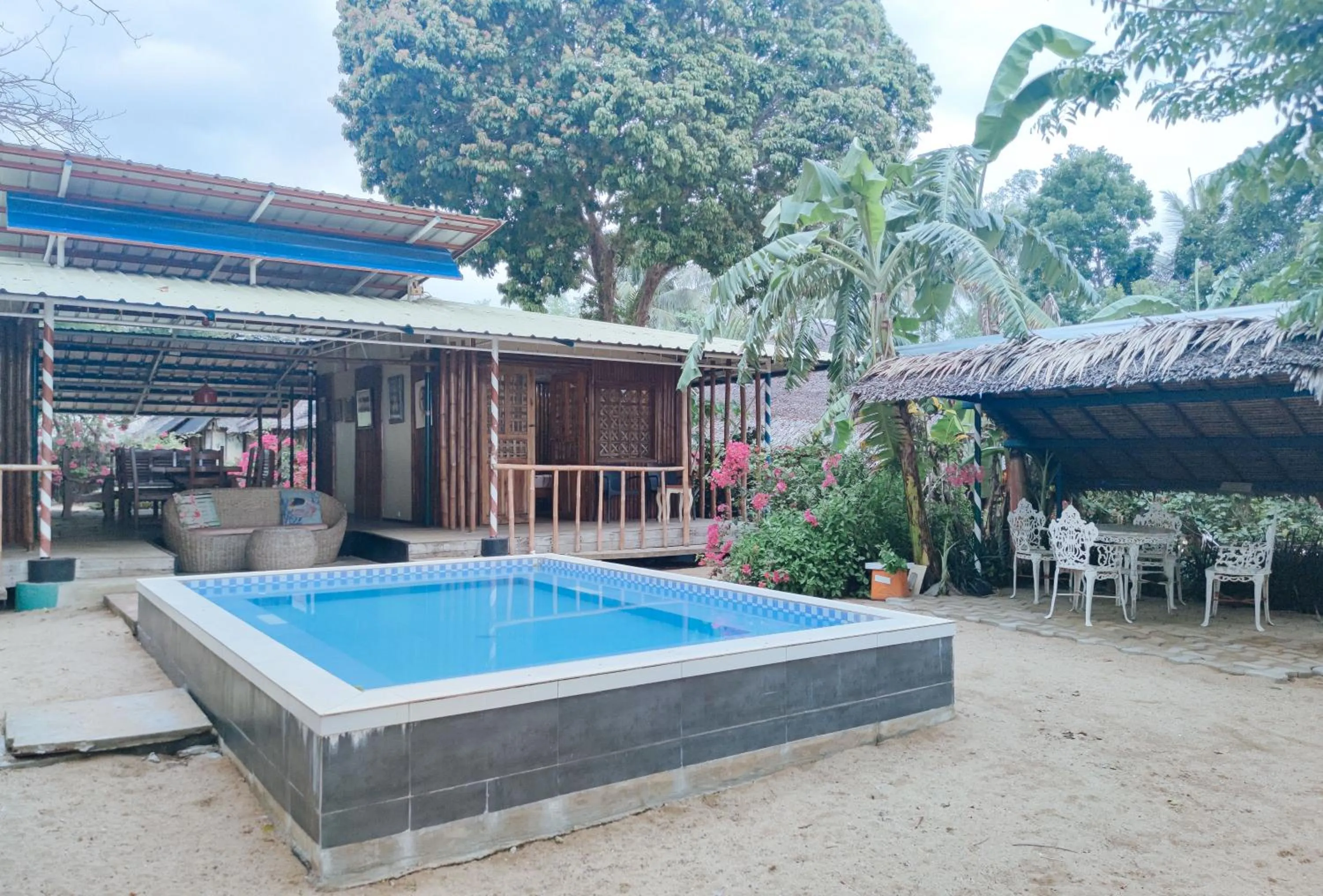 Swimming pool in The Clara Beach and Guest House