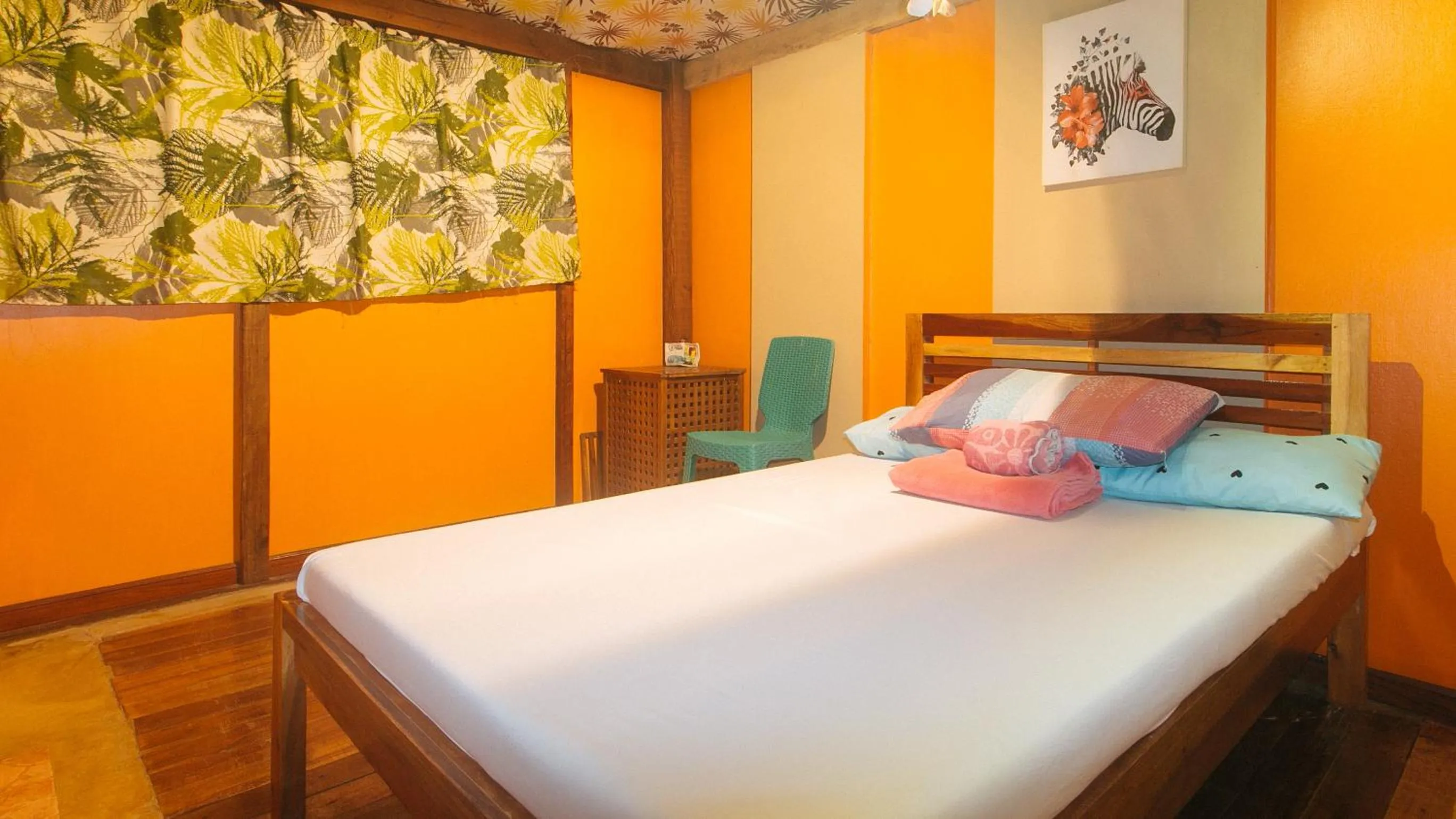 Bed in The Clara Beach and Guest House