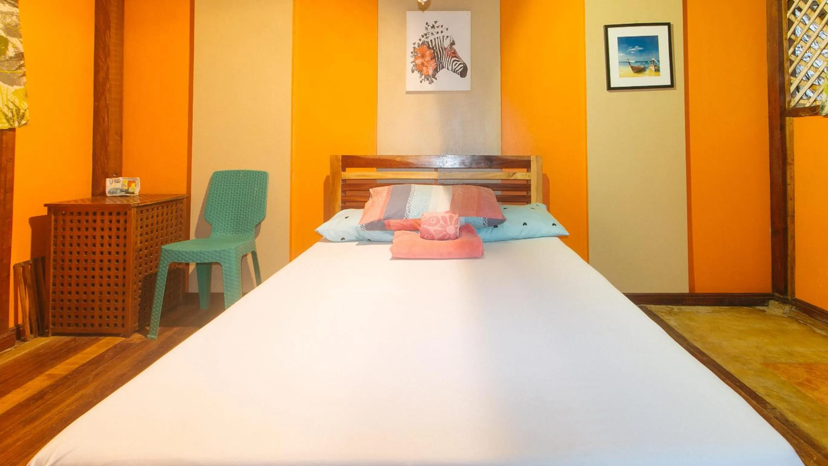 Bed in The Clara Beach and Guest House