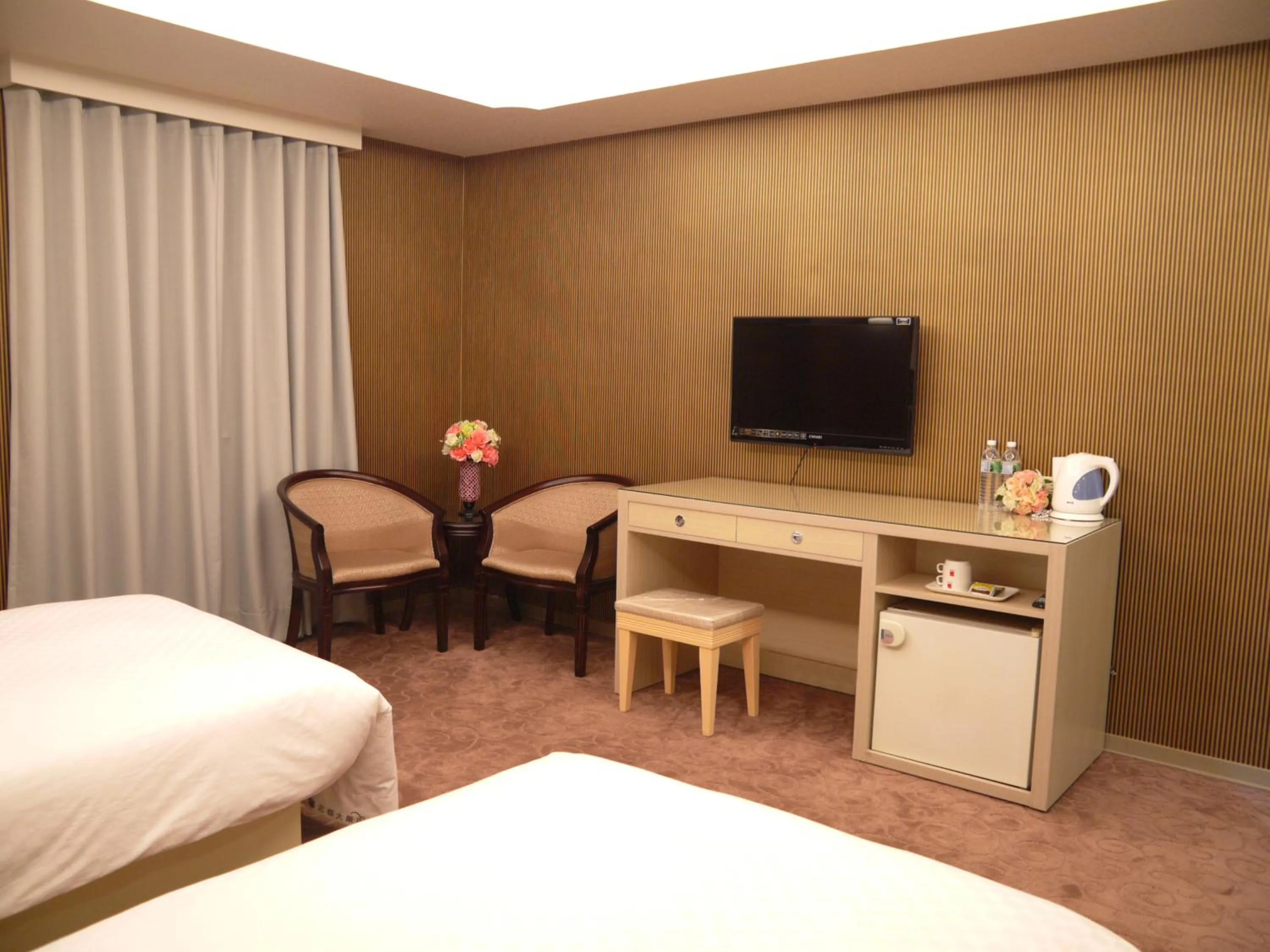 Seating area, Bed in Beidoo Hotel