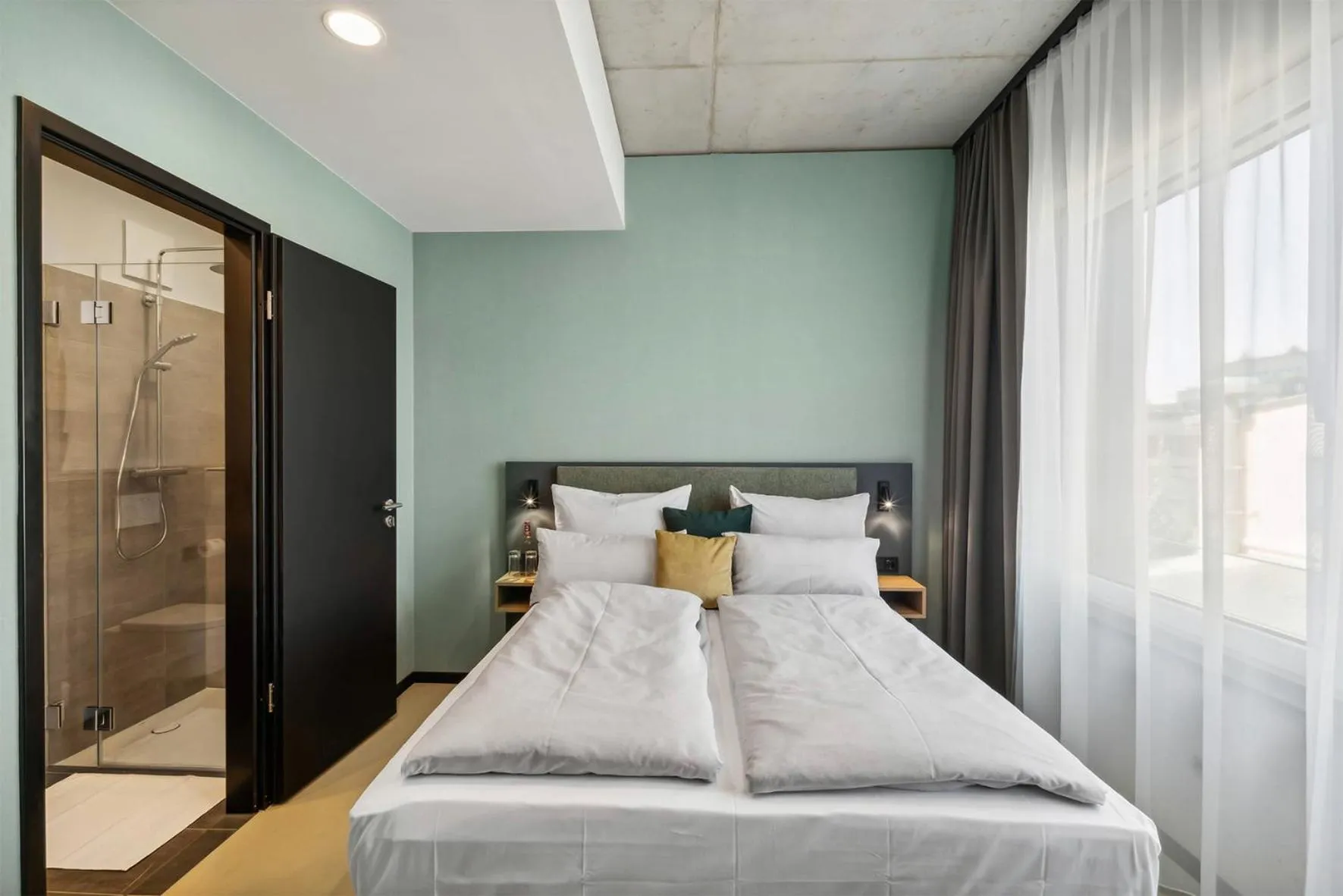 Bed in Nena Apartments München City East