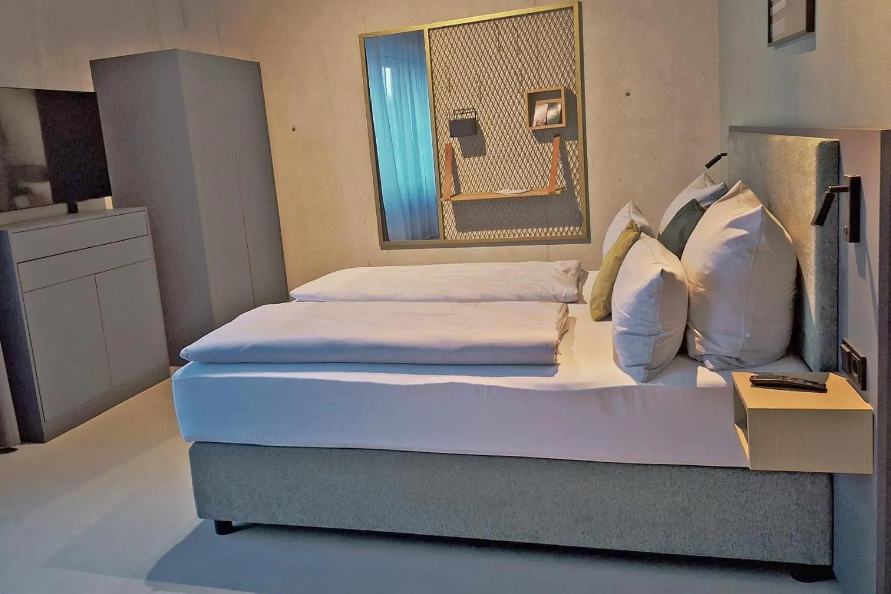 Bed in Nena Apartments München City East