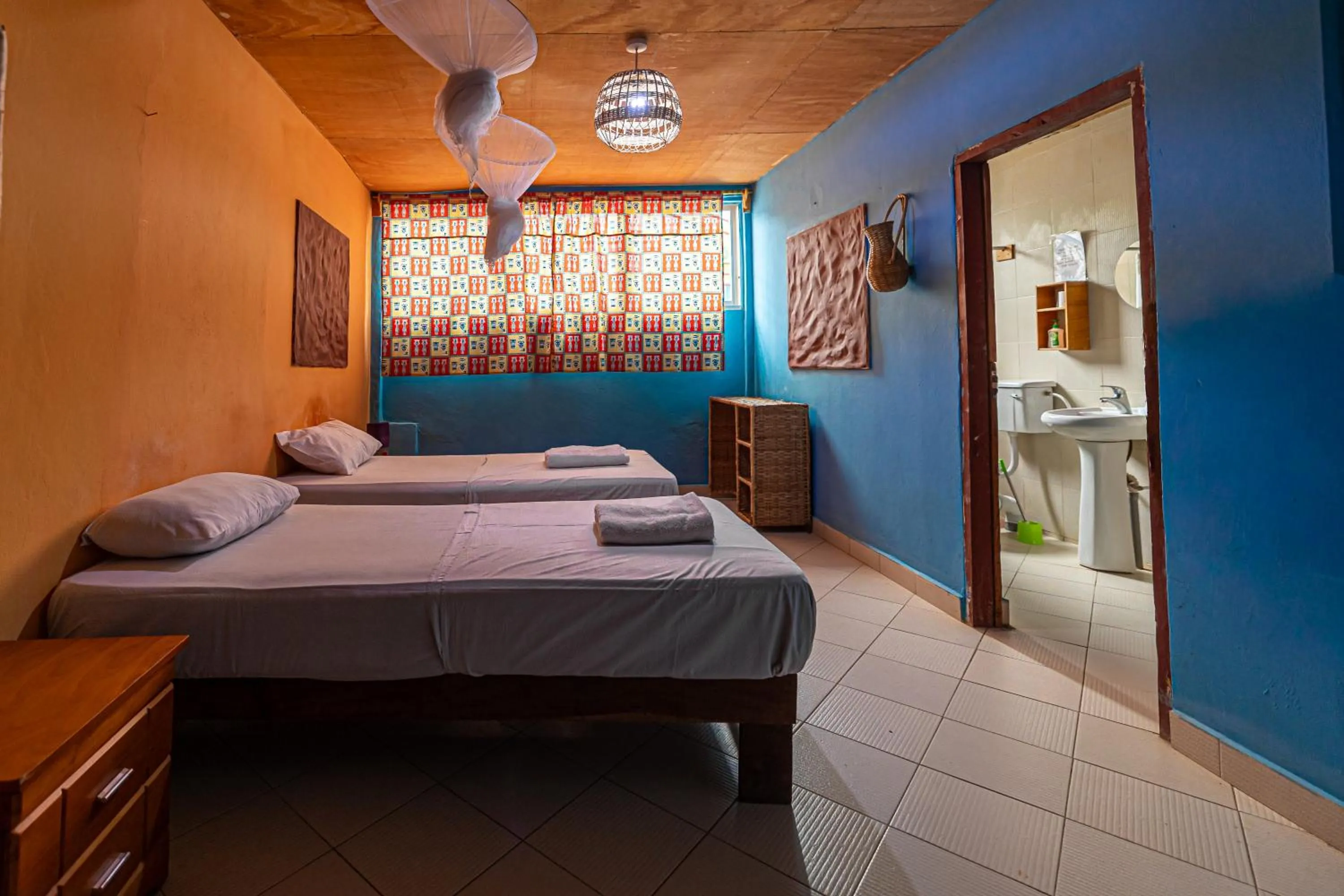 Bed in Mango Lodge Gambia