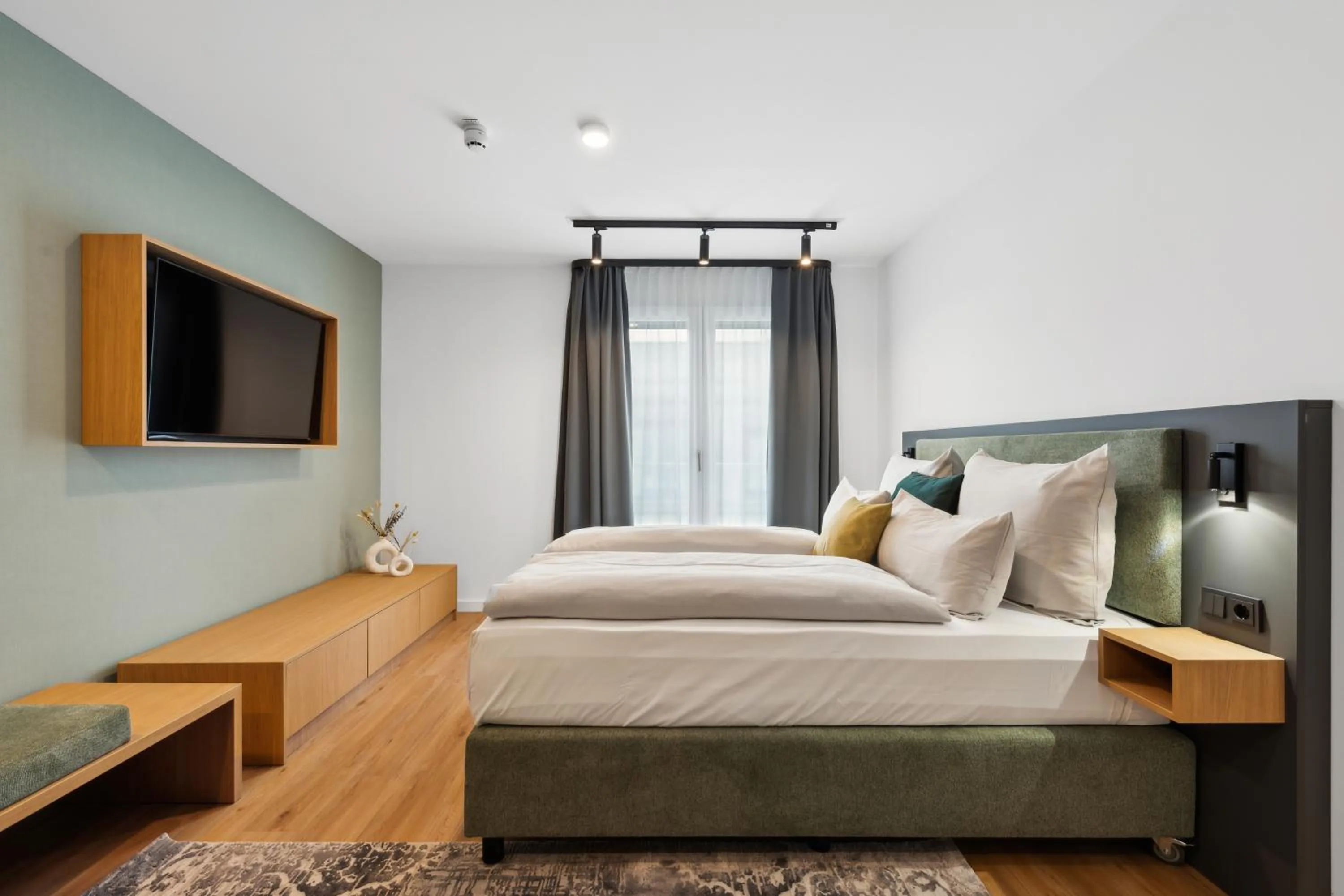 Bed in Nena Apartments München City