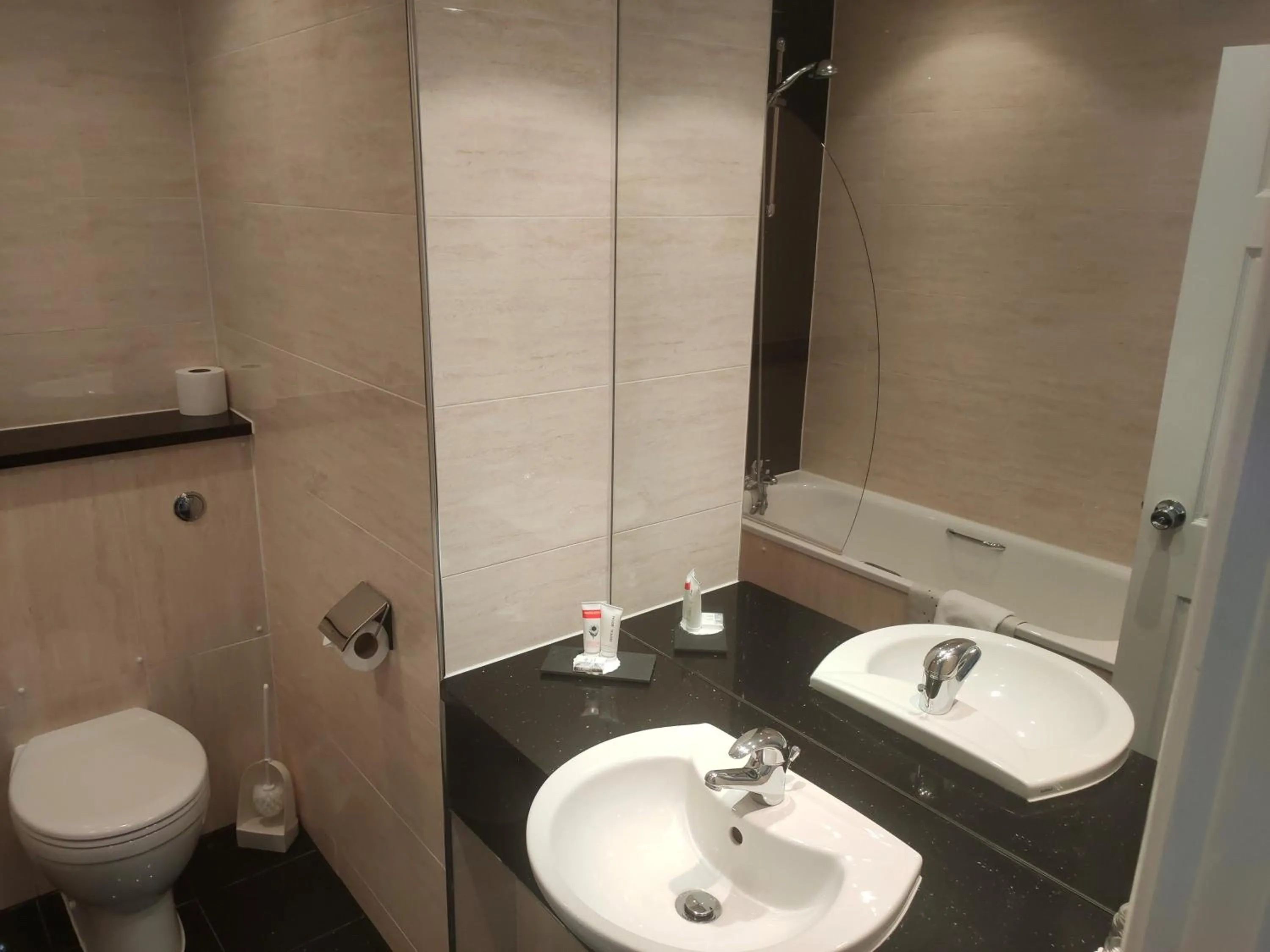 Bathroom in Best Western Premier Heronston Hotel & Spa