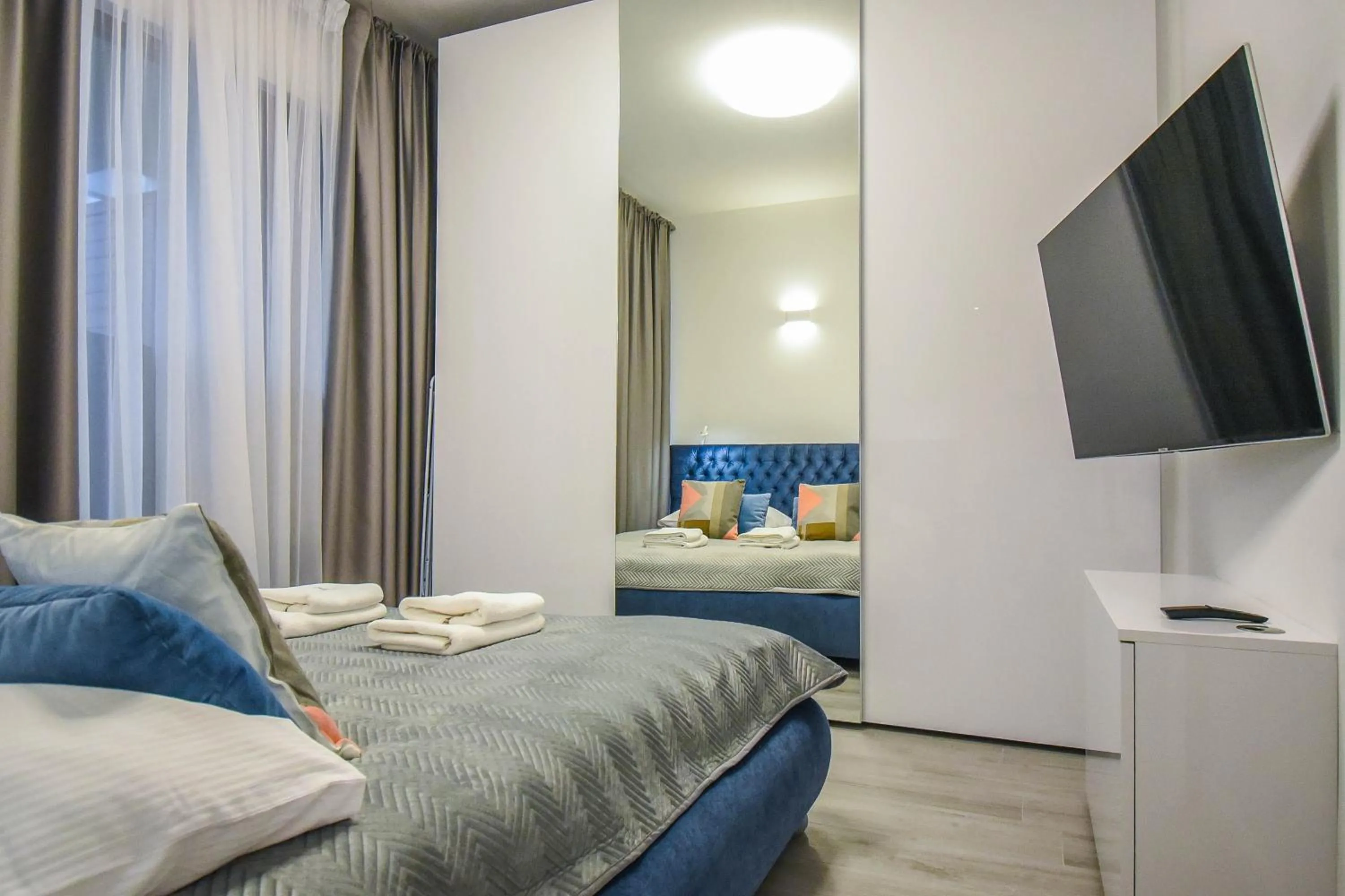 Bed in Apartamenty Na Wyspie - Baltic Park - Apartamenty z sypialnią i parkingiem - ul Uzdrowiskowa 24-34