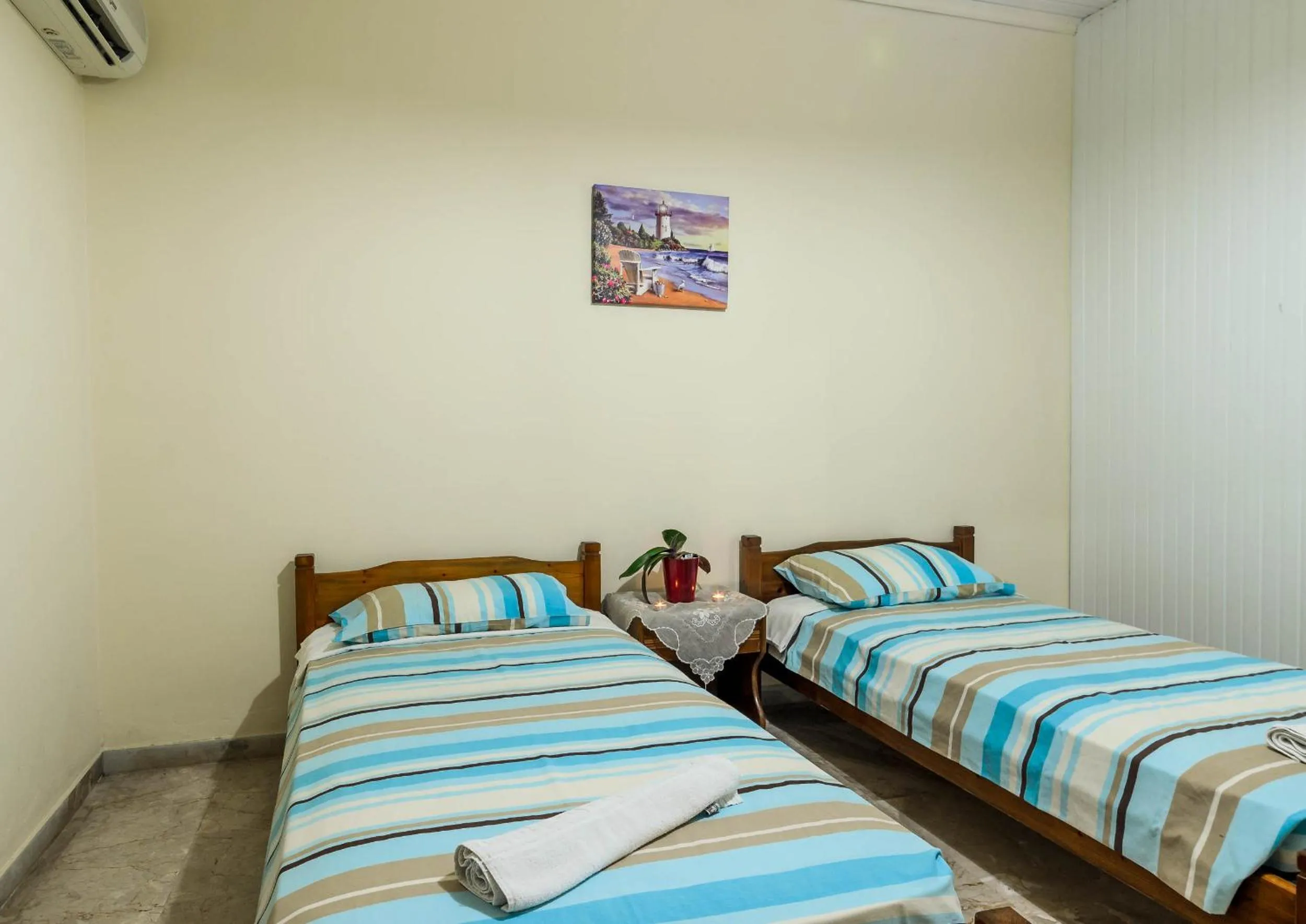 Bed in Borsalino Studios & Apartments