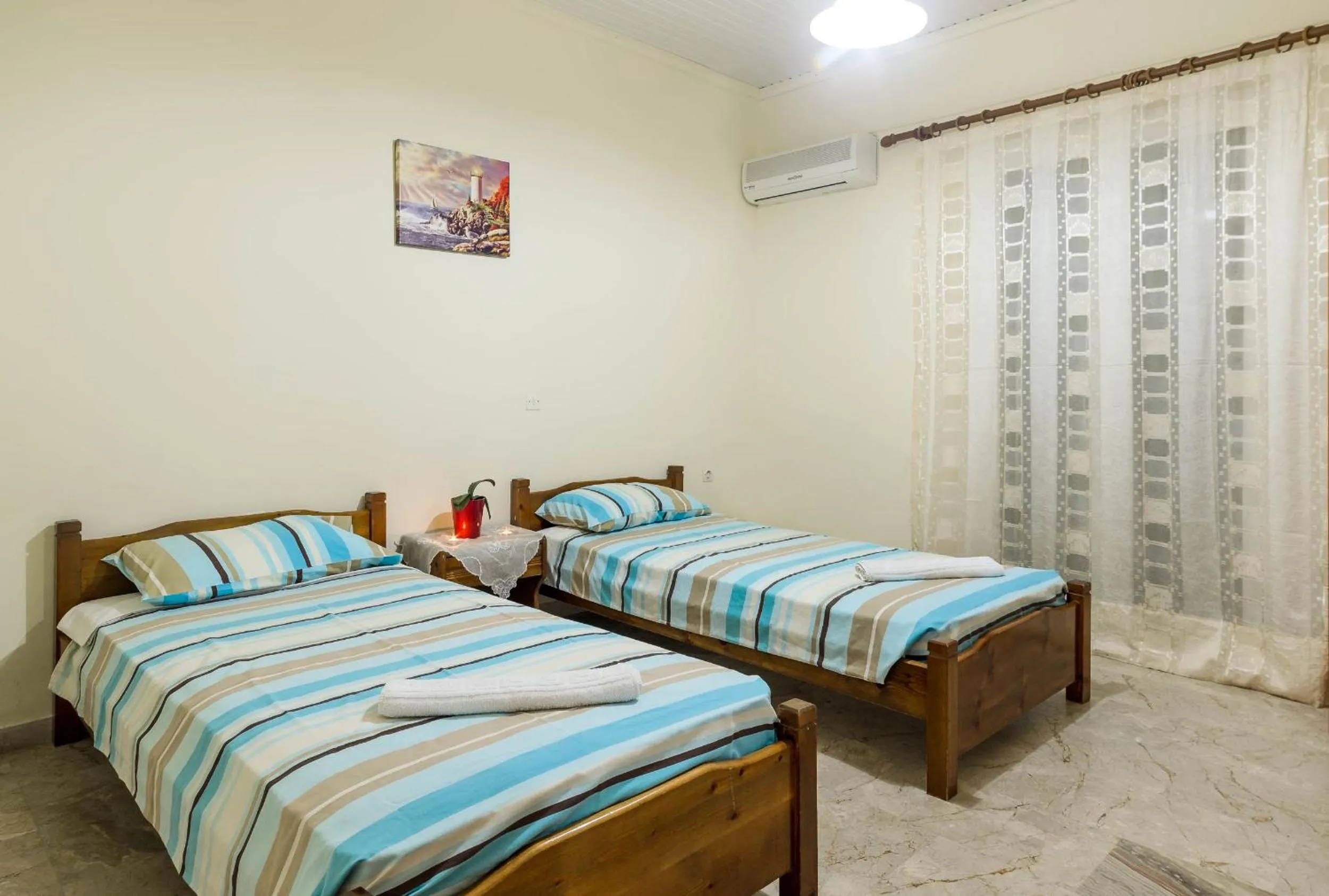 Bed in Borsalino Studios & Apartments