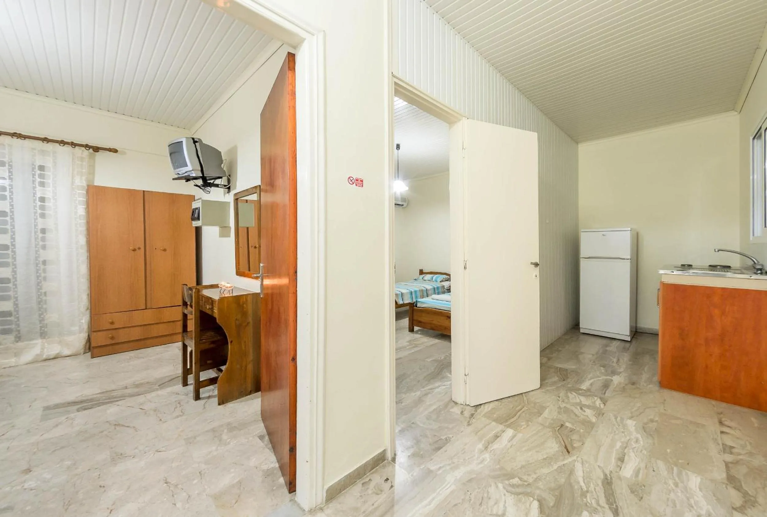 Bed in Borsalino Studios & Apartments