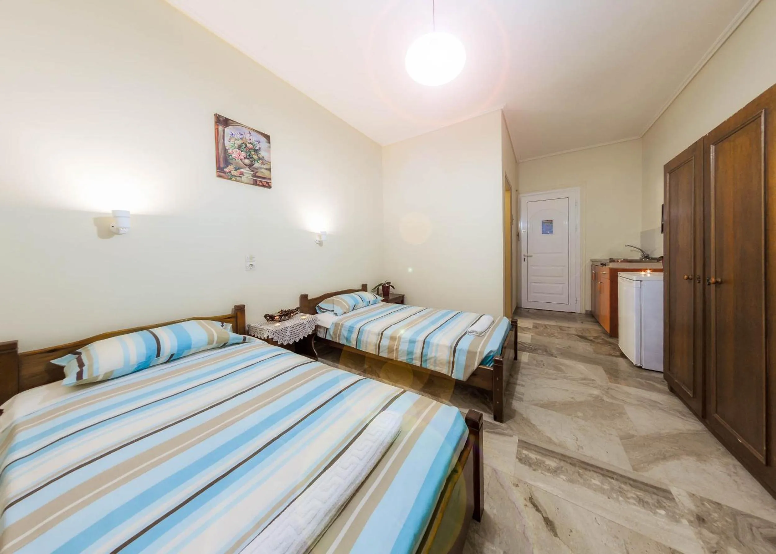 Bed in Borsalino Studios & Apartments