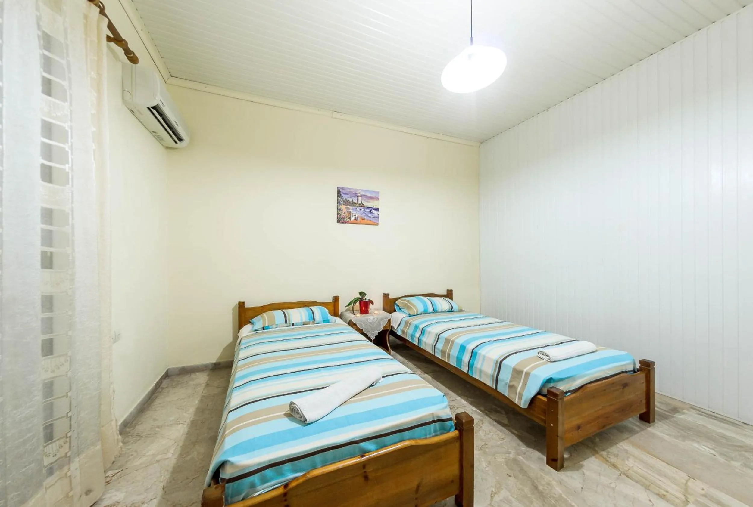Bed in Borsalino Studios & Apartments