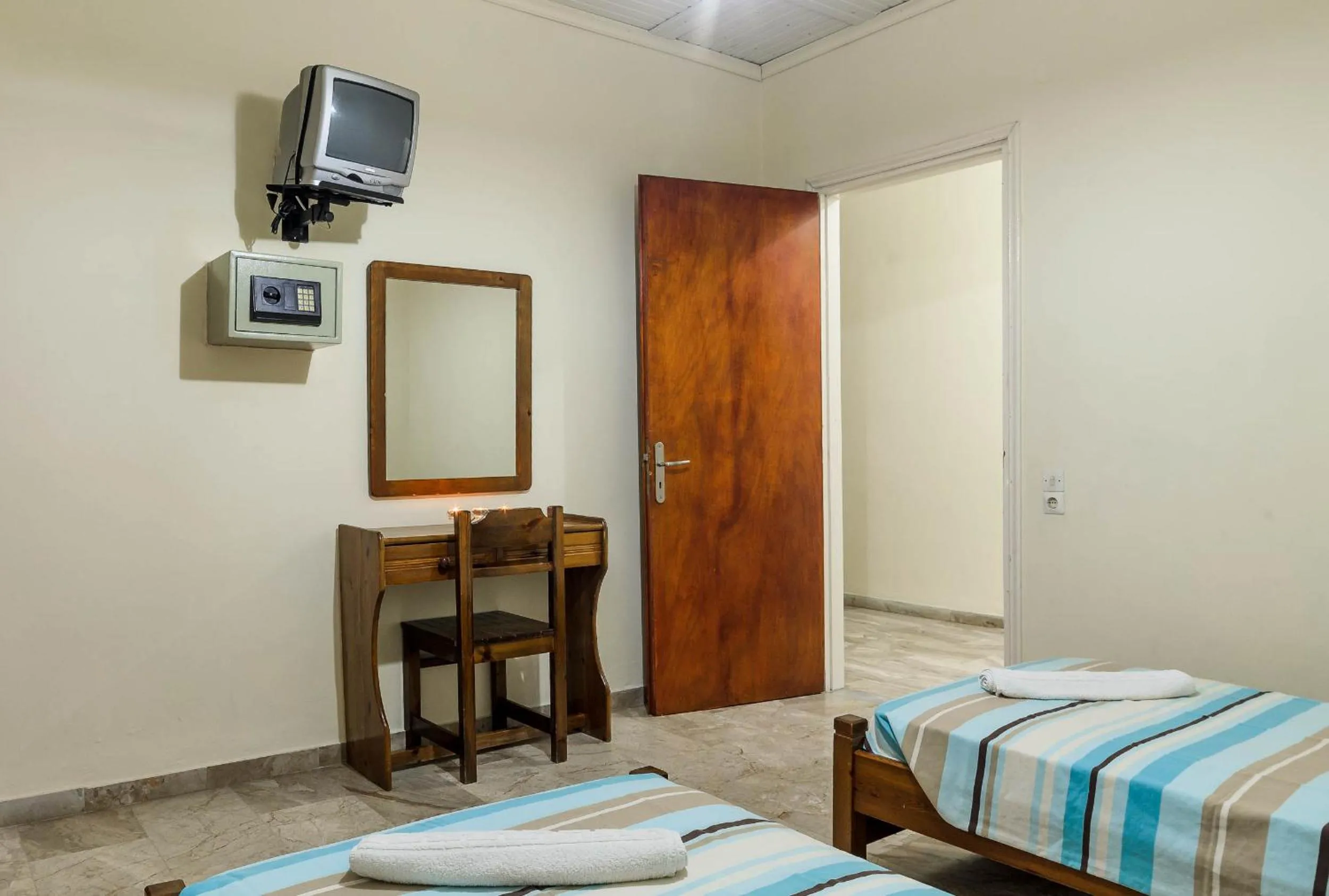 Bed in Borsalino Studios & Apartments
