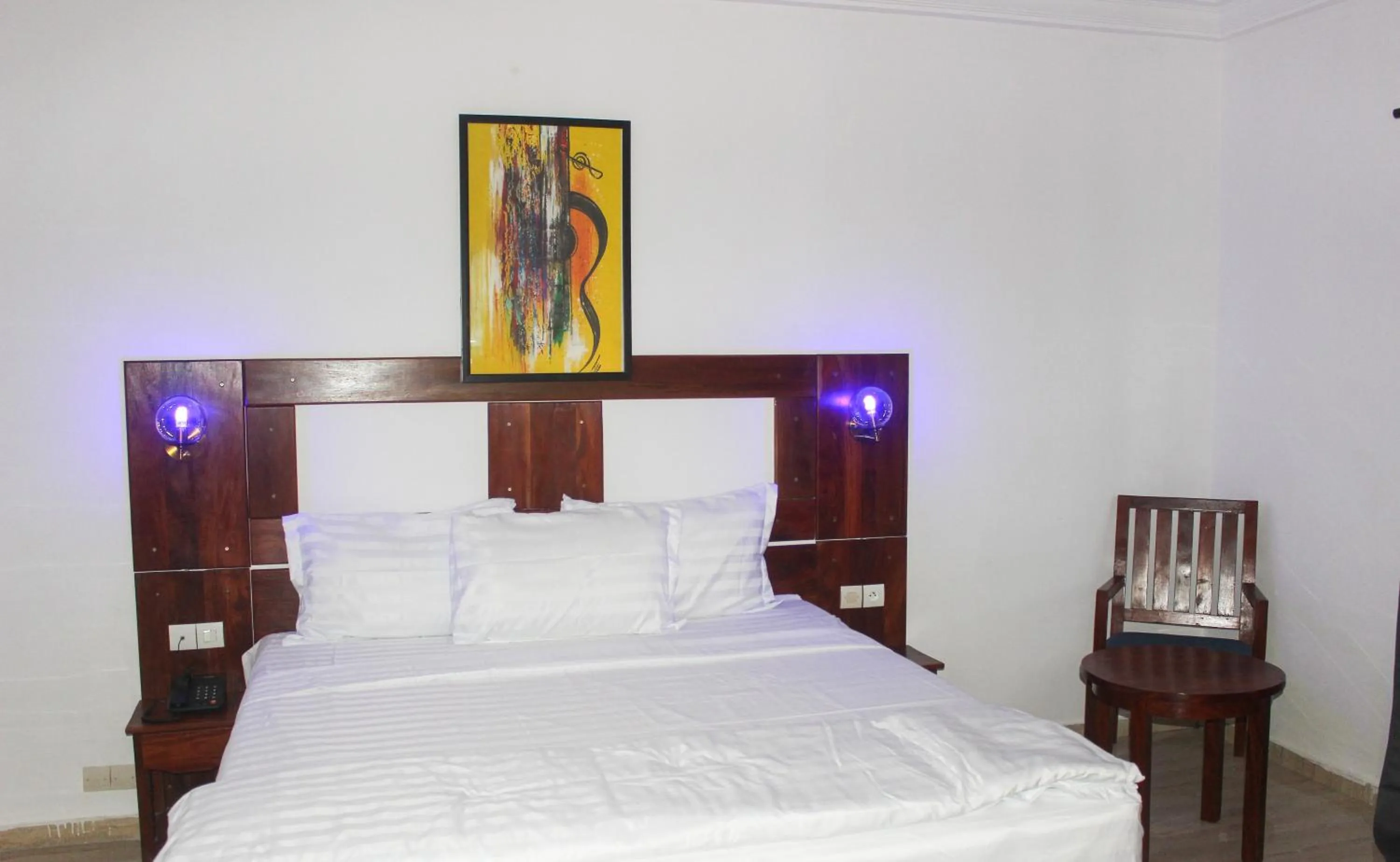 Bed in Hotel BKBG Benin