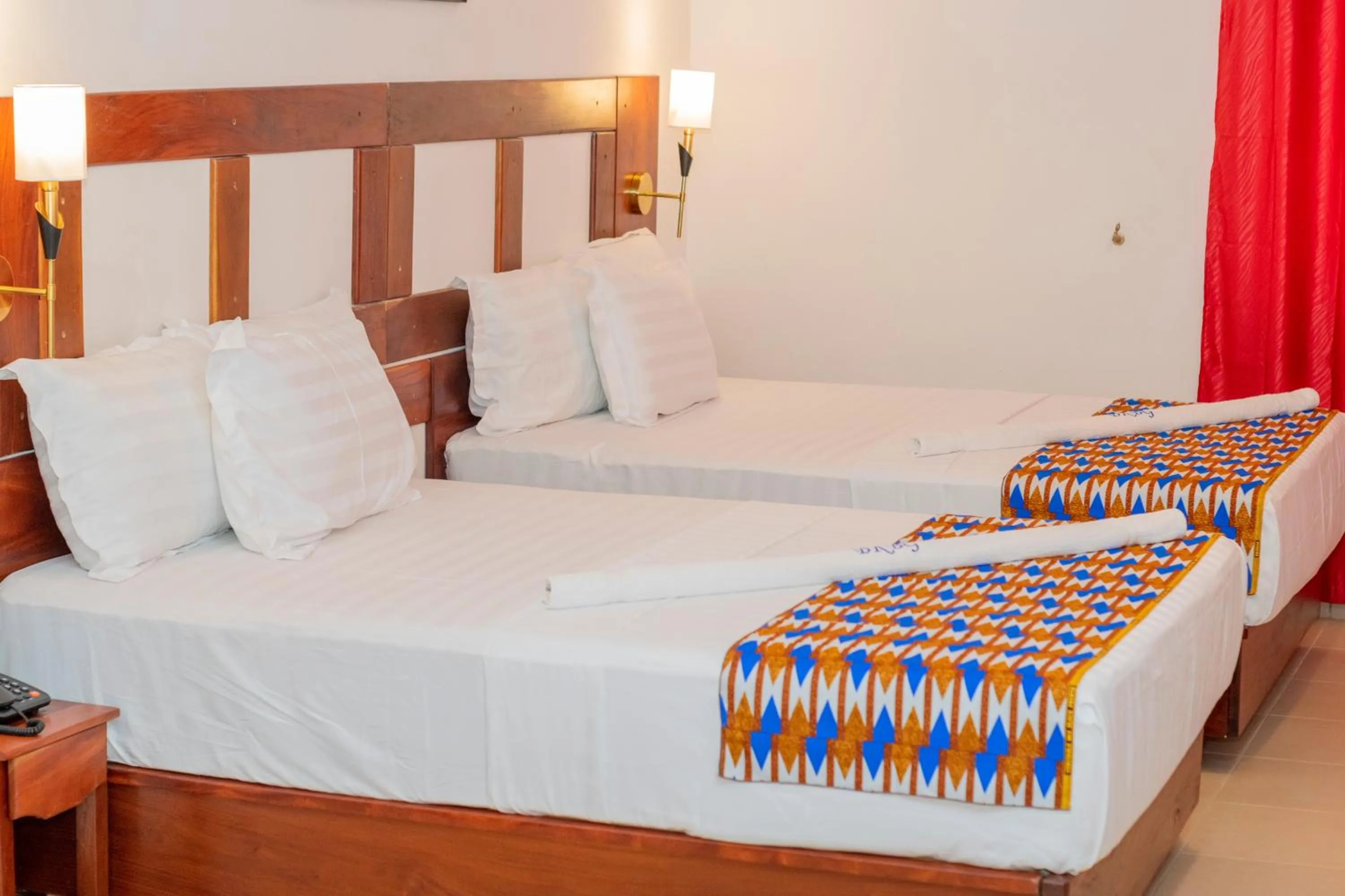 Bed in Hotel BKBG Benin
