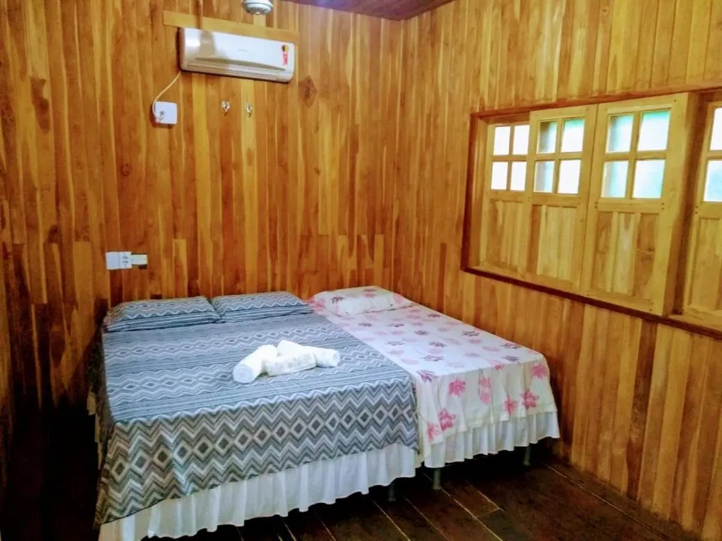 Photo of the whole room, Bed in Pousada Bosque dos Aruãs