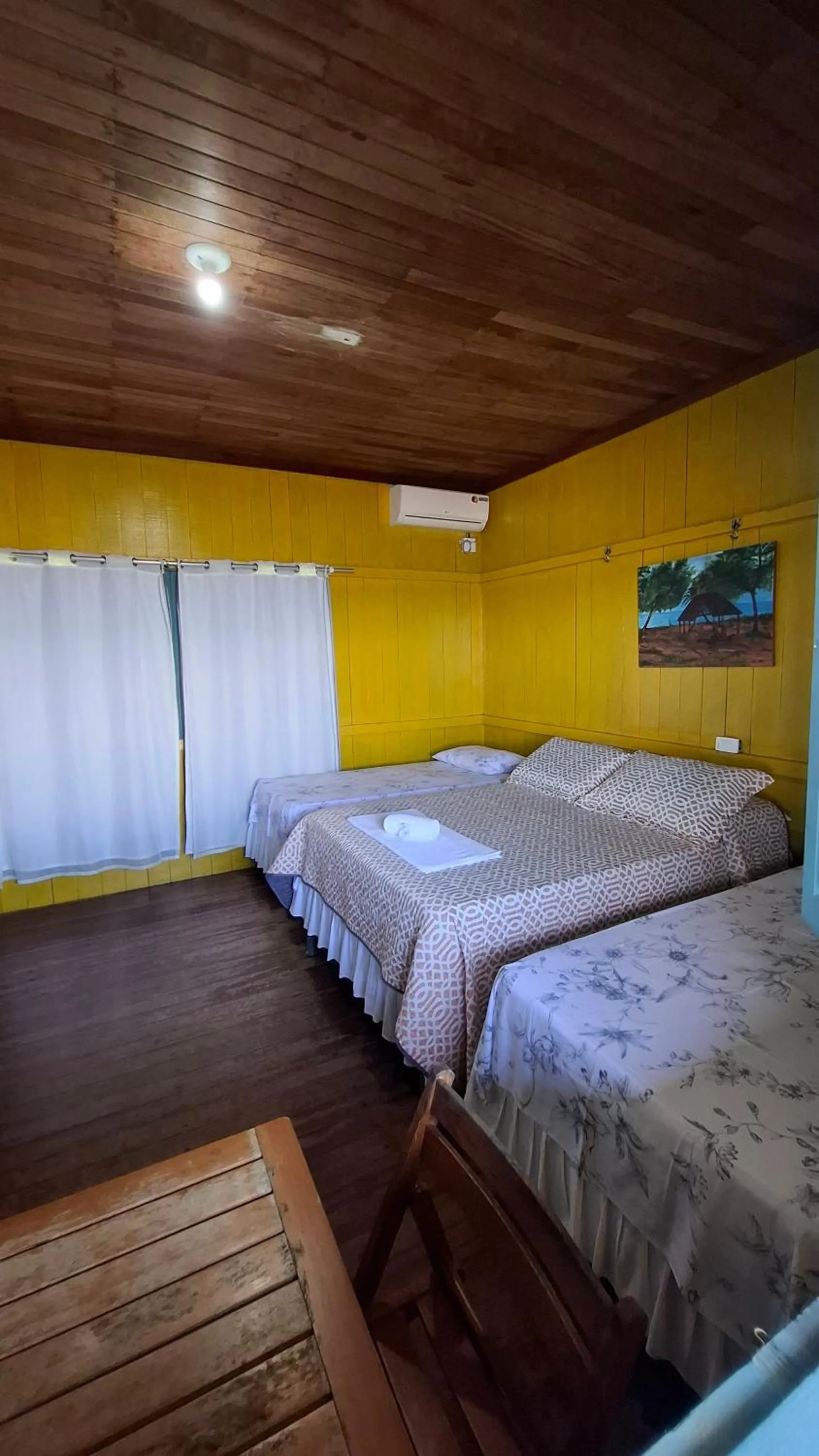 Bed in Pousada Bosque dos Aruãs