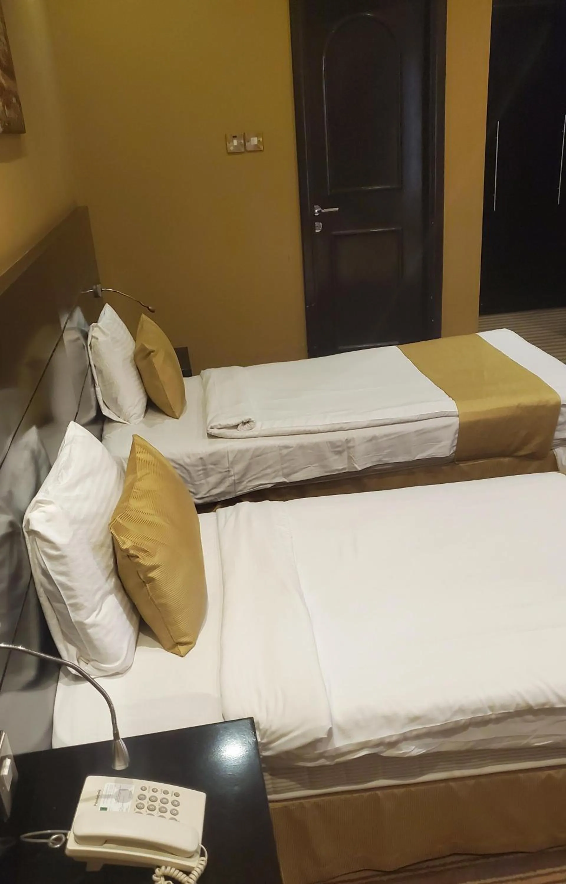 Bed in Aldar Hotel