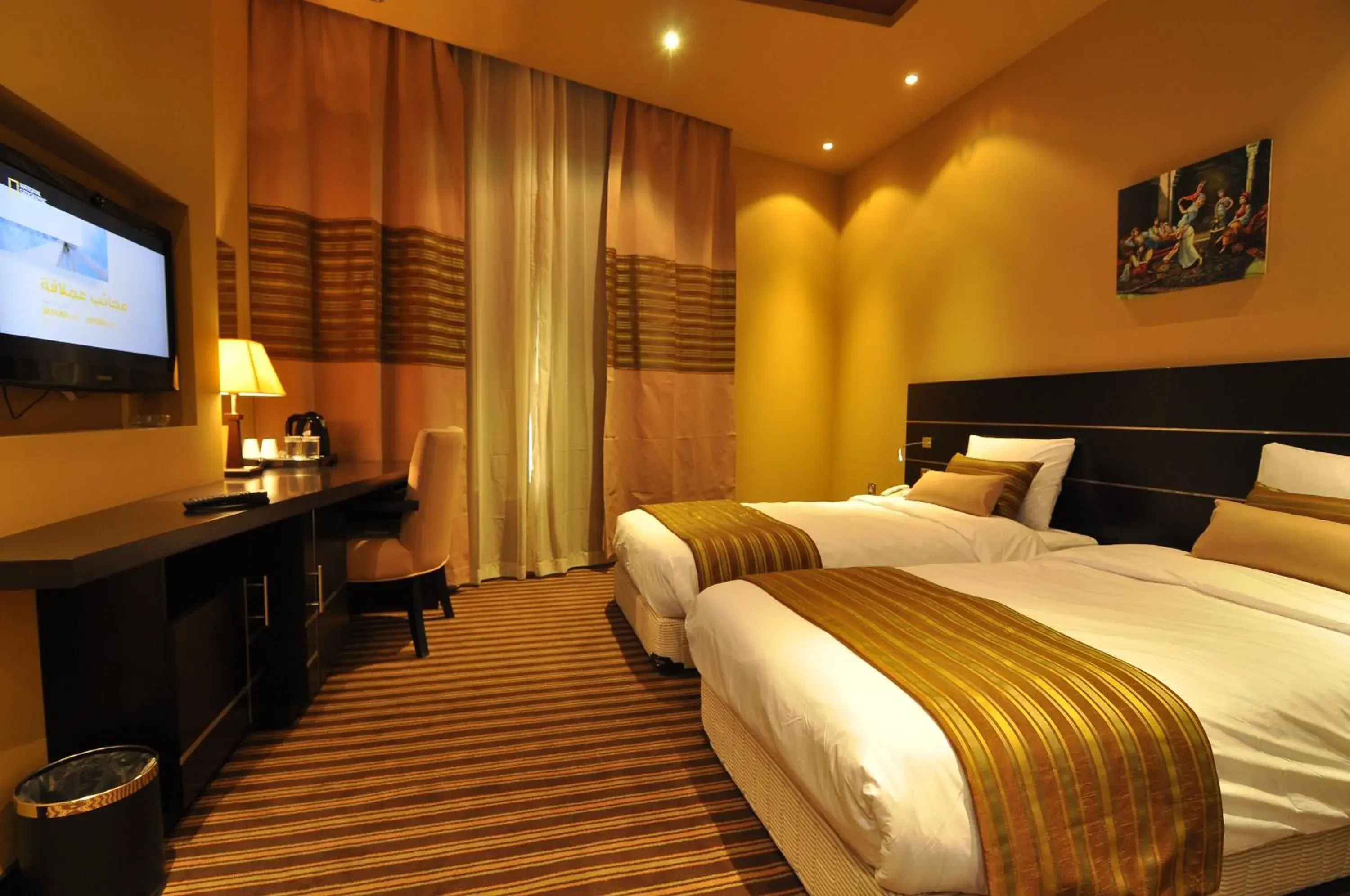 Bed in Aldar Hotel