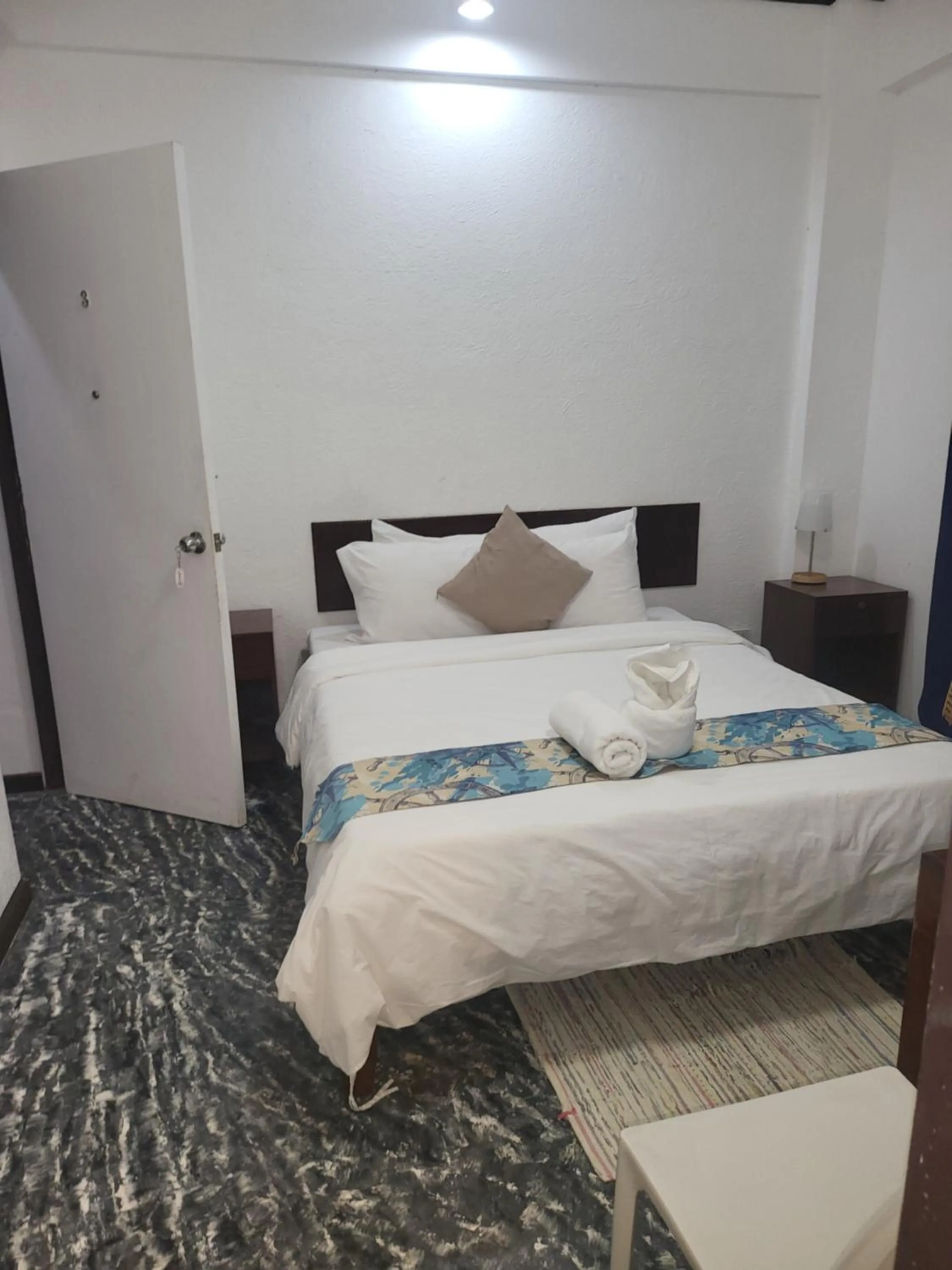 Bed in Sunvilla beachfront hotel