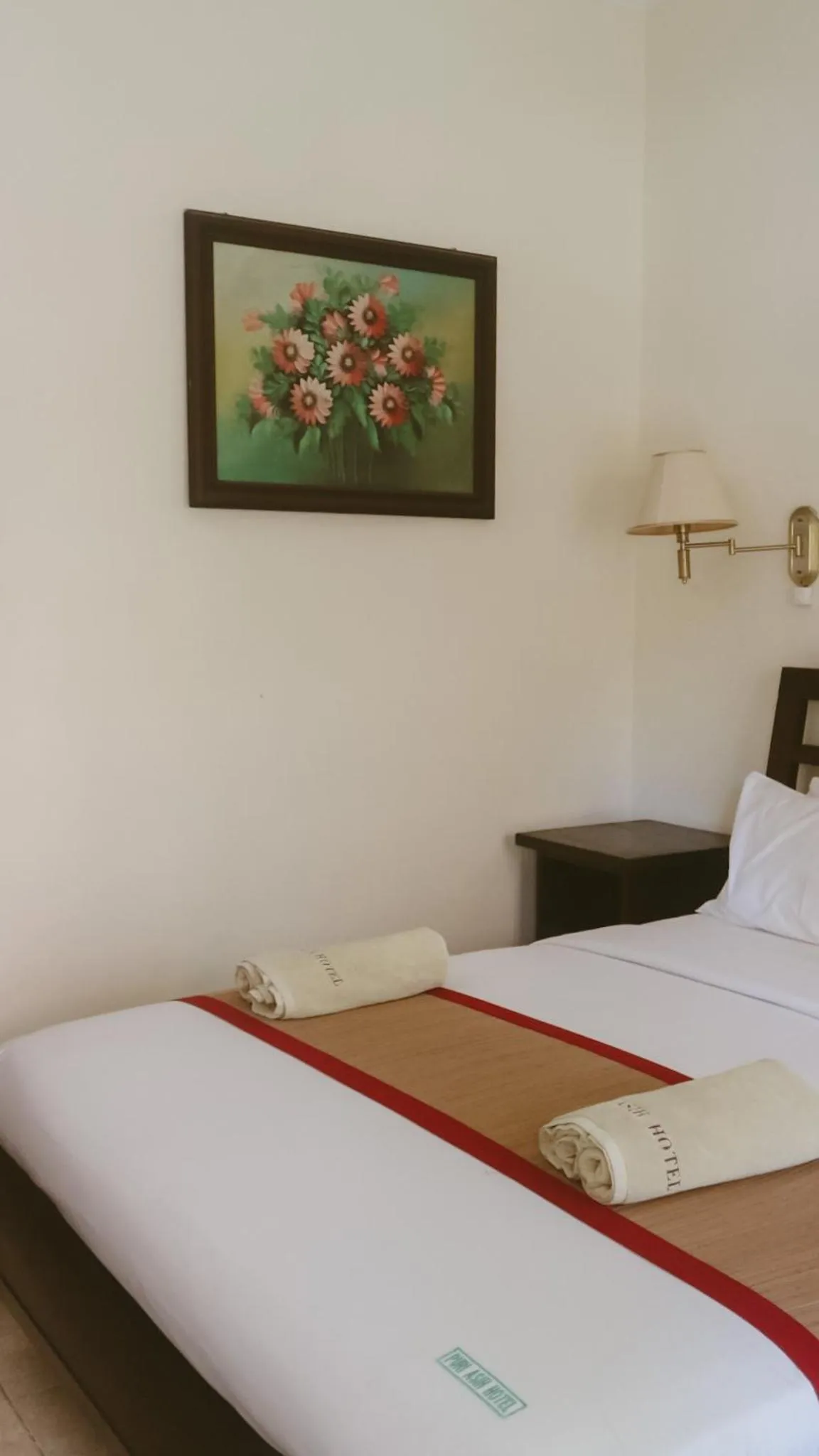 Bed in New Puri Asih Hotel