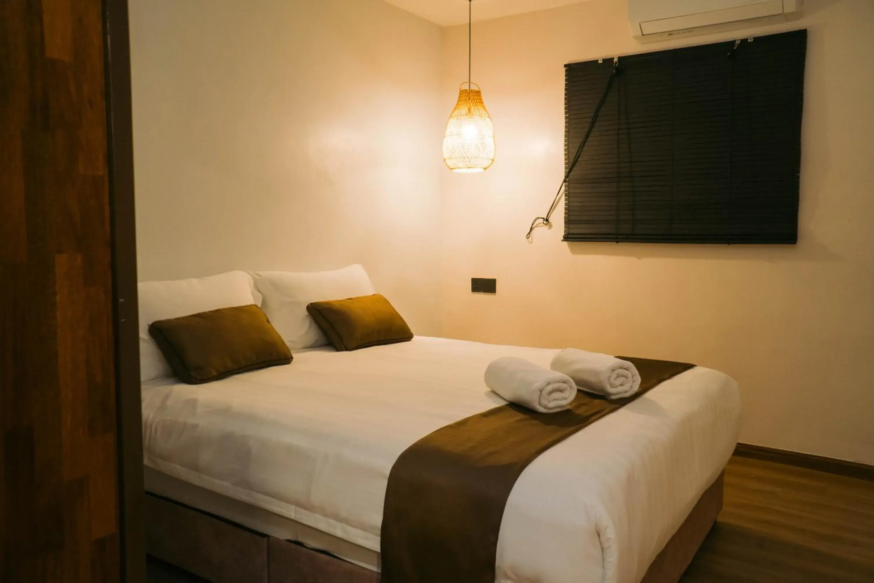 Bed in Mulyo Hotel Bed in Mulyo Hotel