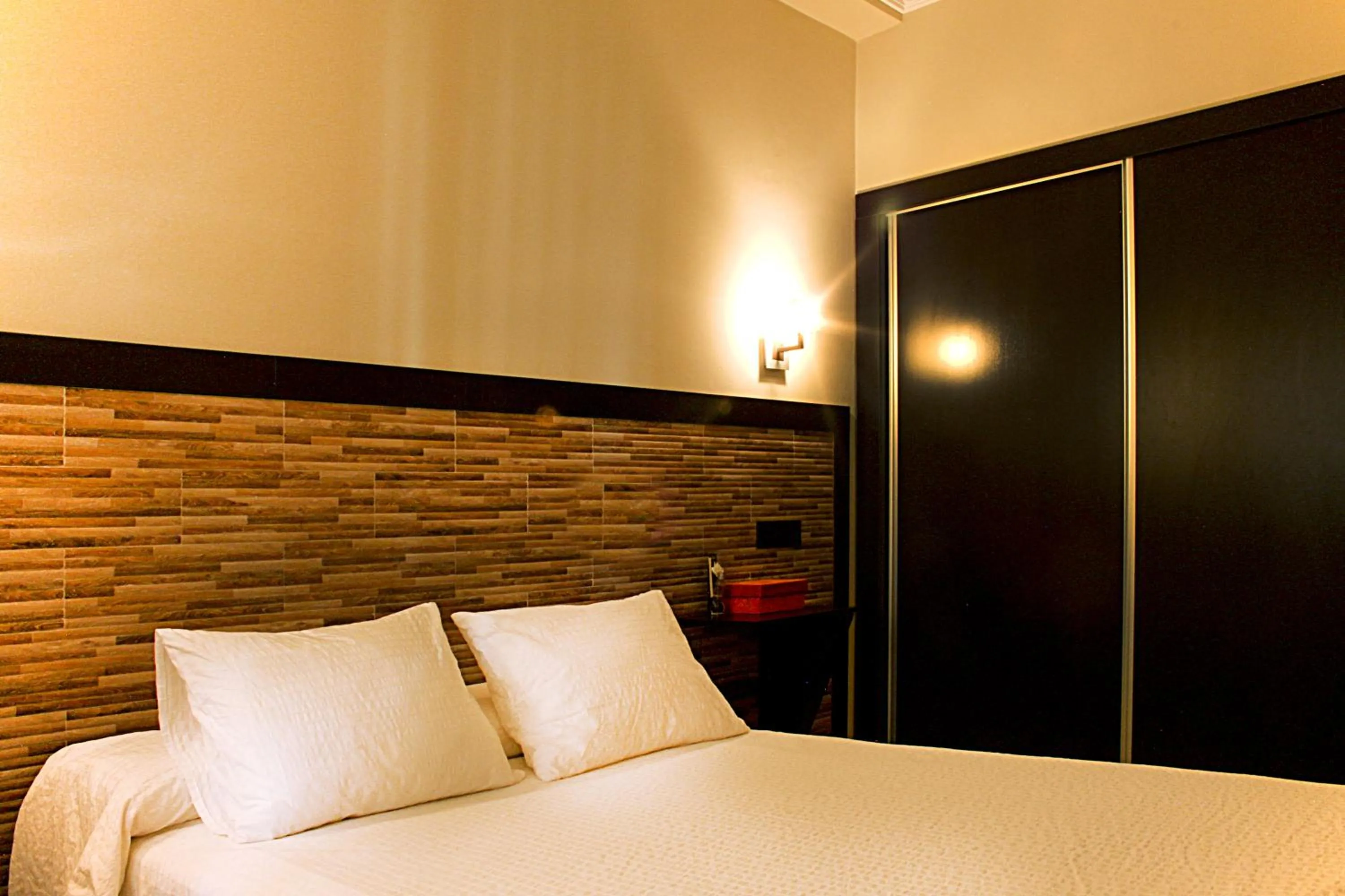 Bedroom, Bed in Apartamentos Turísticos Cúllar Vega