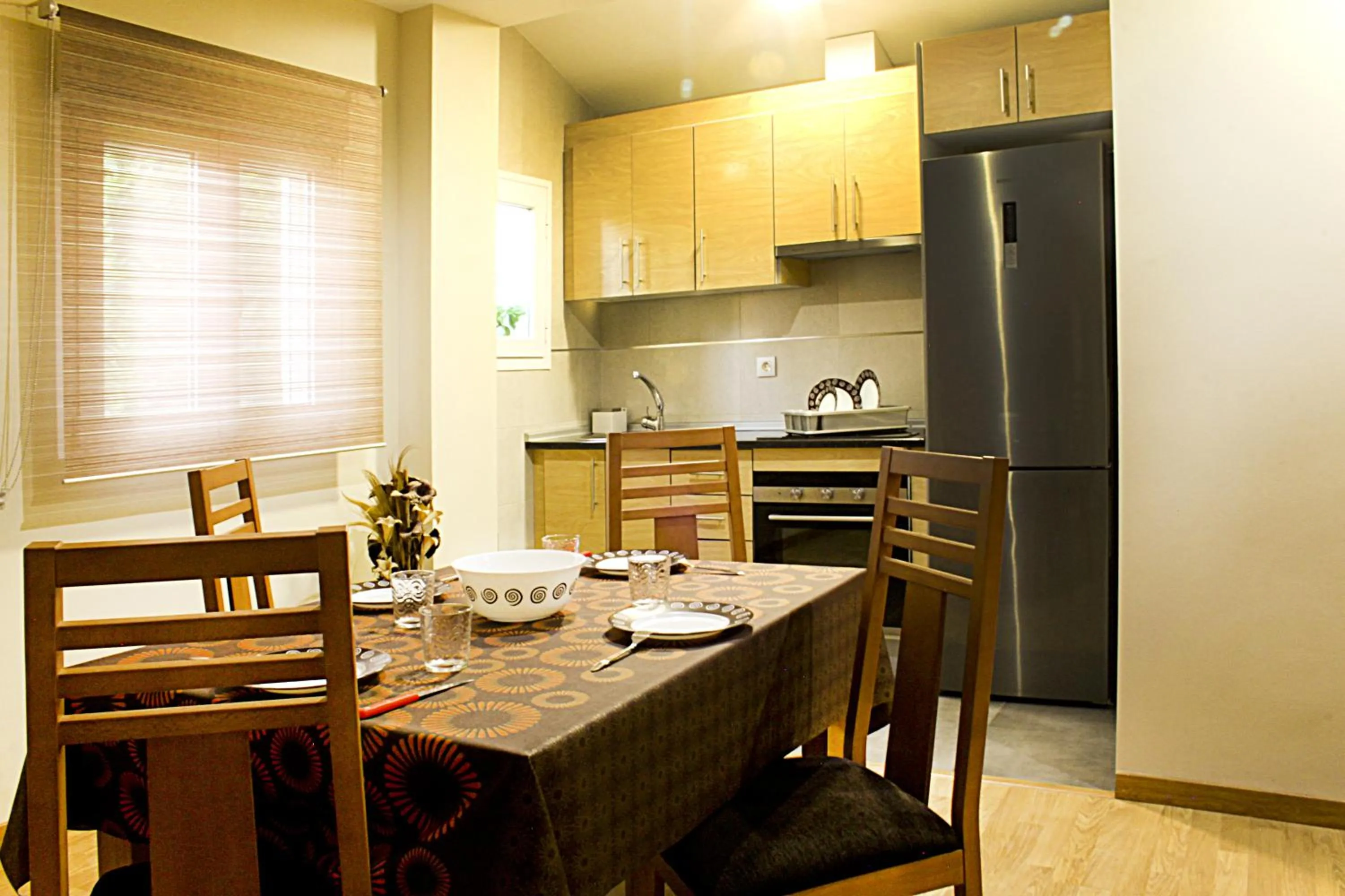 Kitchen or kitchenette in Apartamentos Turísticos Cúllar Vega