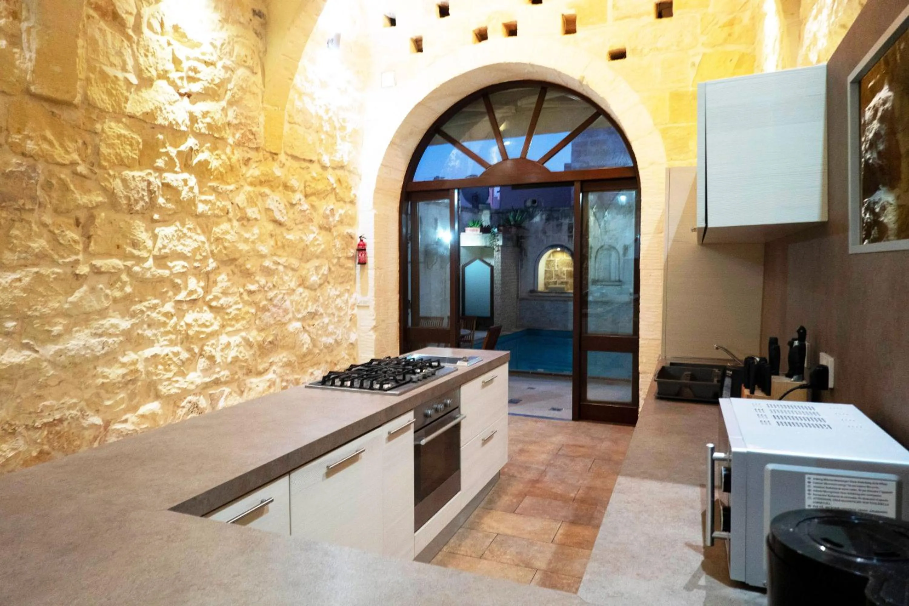 Kitchen or kitchenette in Mixel Gozitan Villa and Pool - Happy Rentals