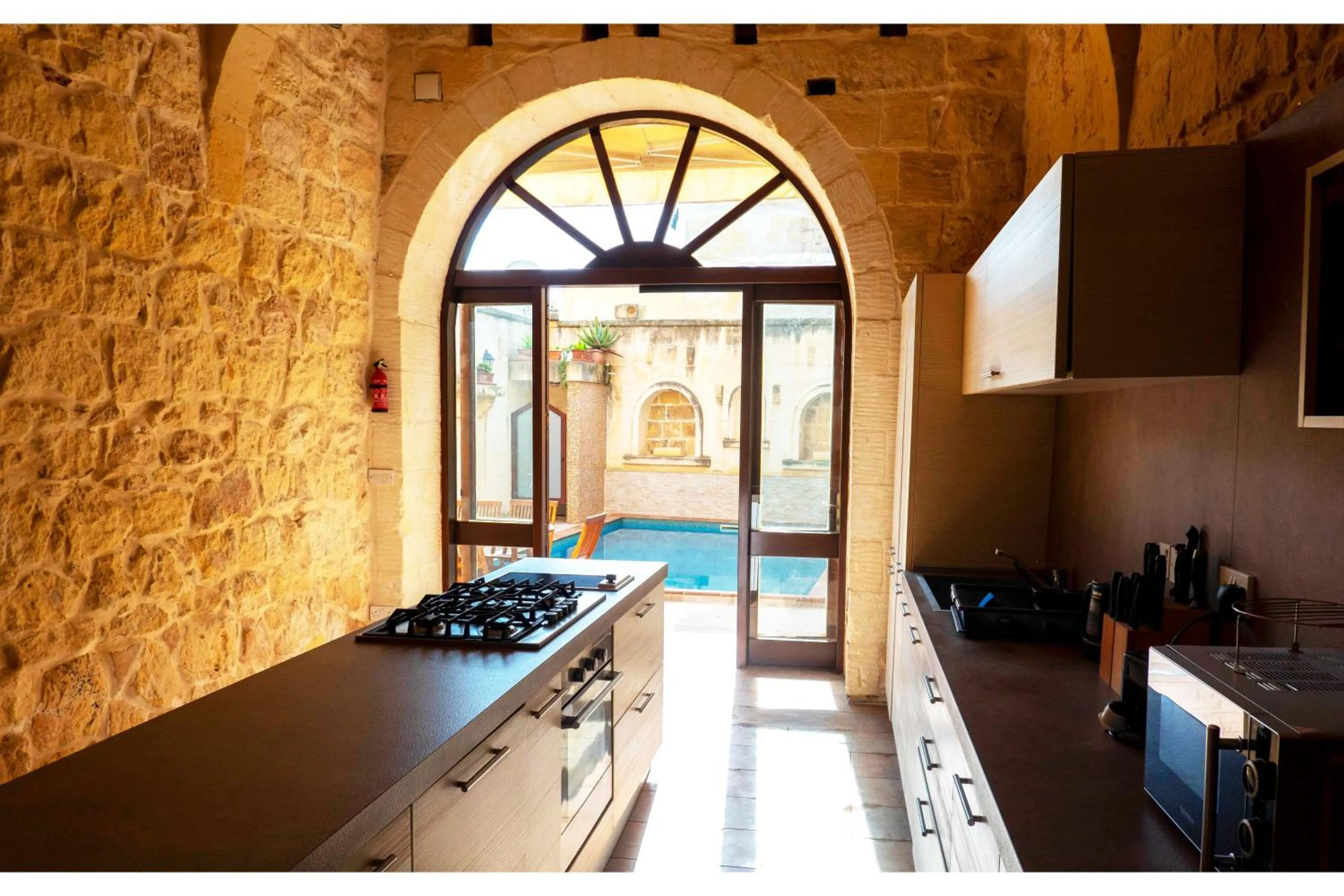 Kitchen or kitchenette in Mixel Gozitan Villa and Pool - Happy Rentals