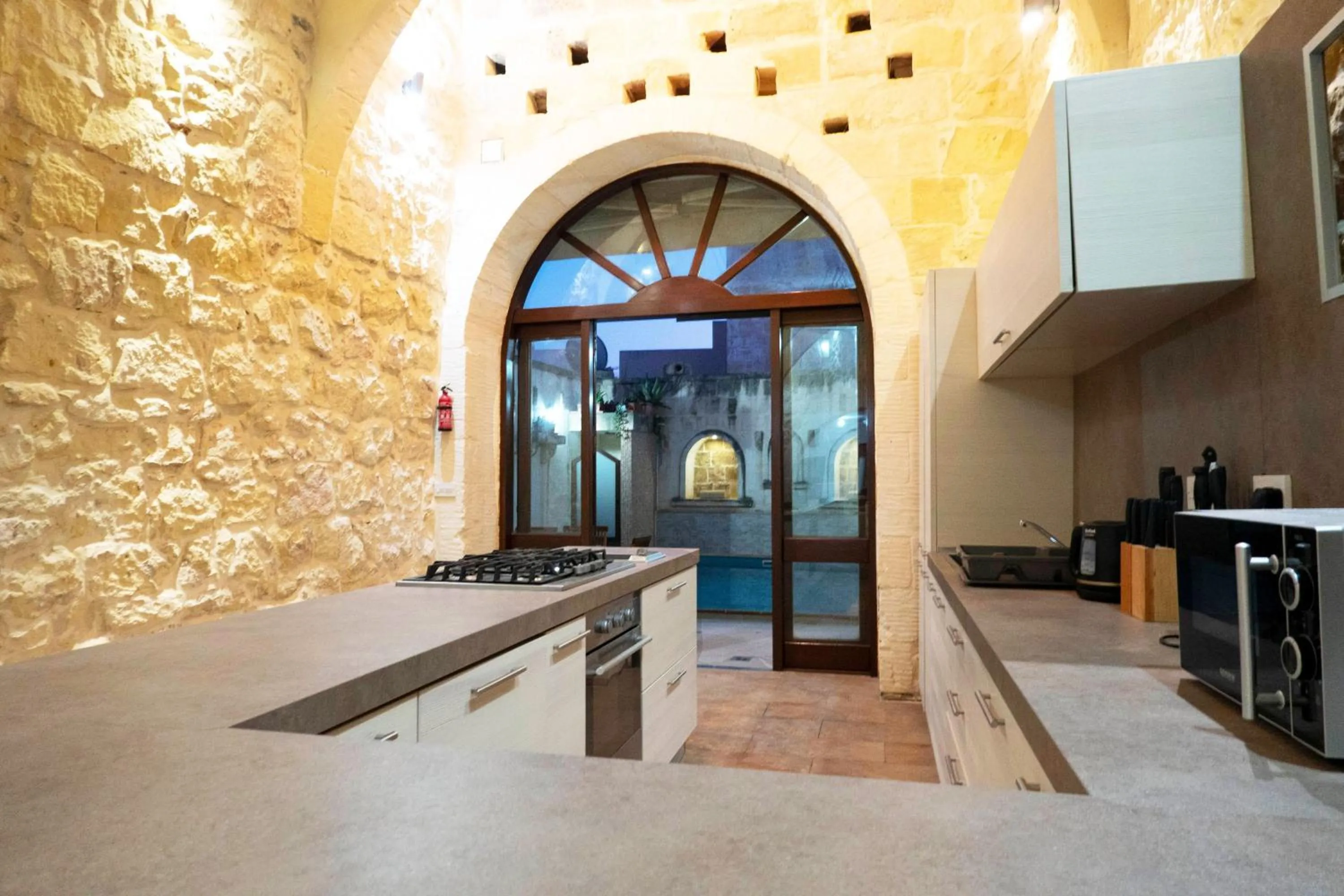 Kitchen or kitchenette in Mixel Gozitan Villa and Pool - Happy Rentals