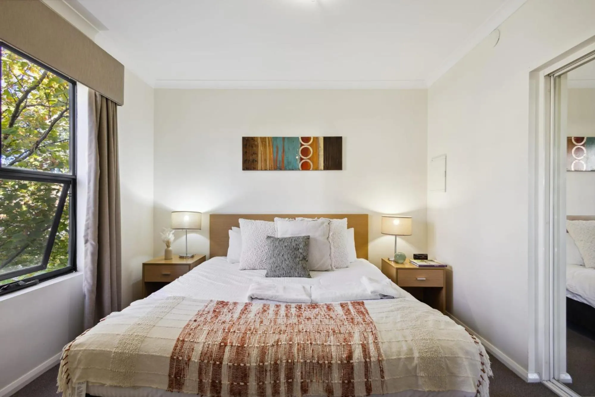 Bed in Urban Serenity 2 Bedroom Apt with Stunning Views