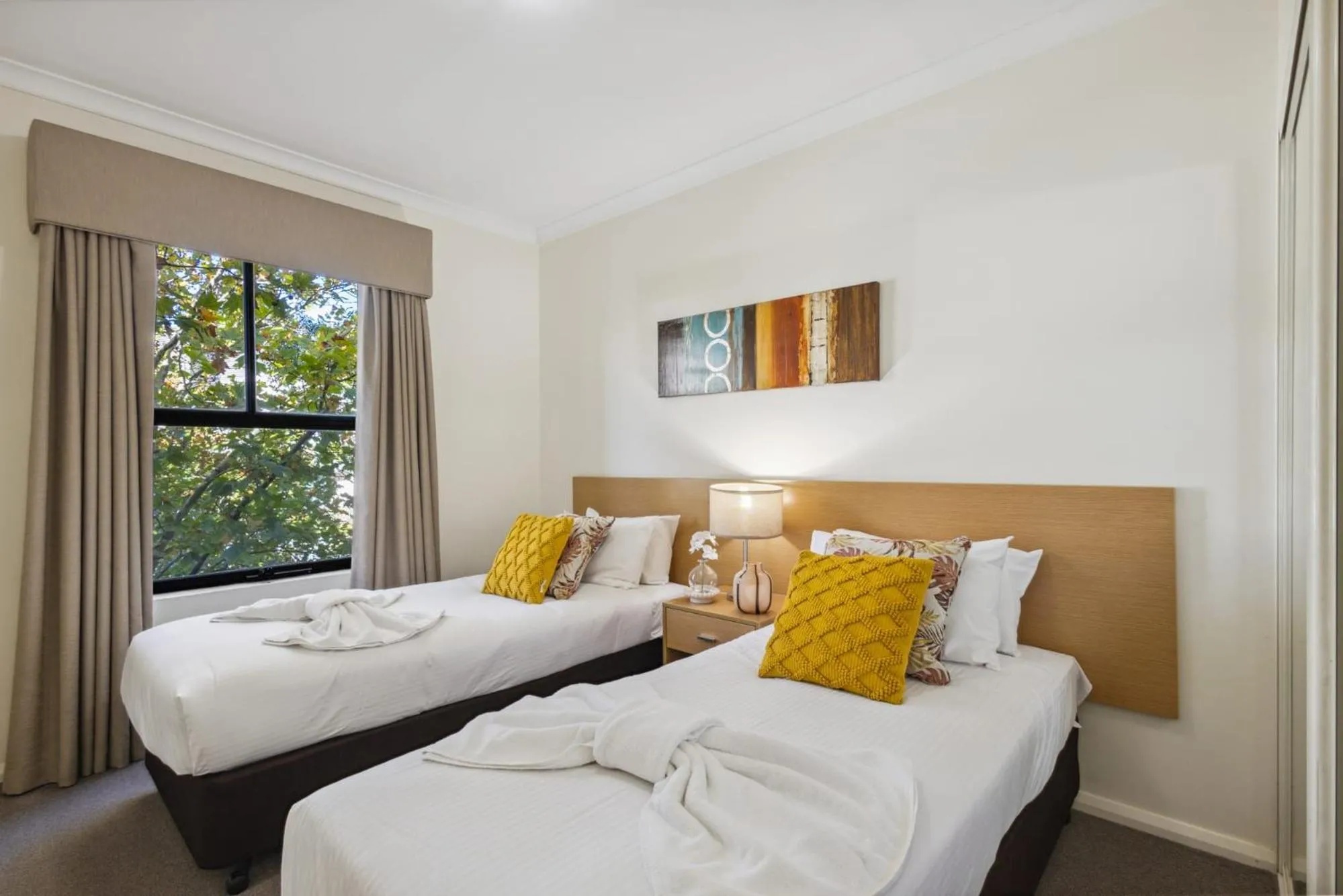 Bed in Urban Serenity 2 Bedroom Apt with Stunning Views