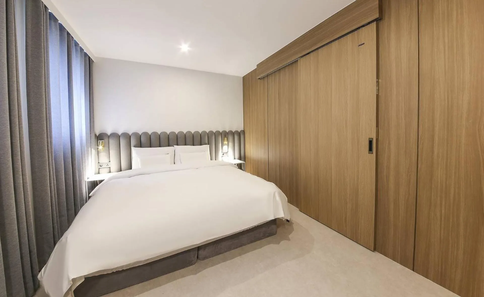 Bed in H-avenue Hotel Munhyeon