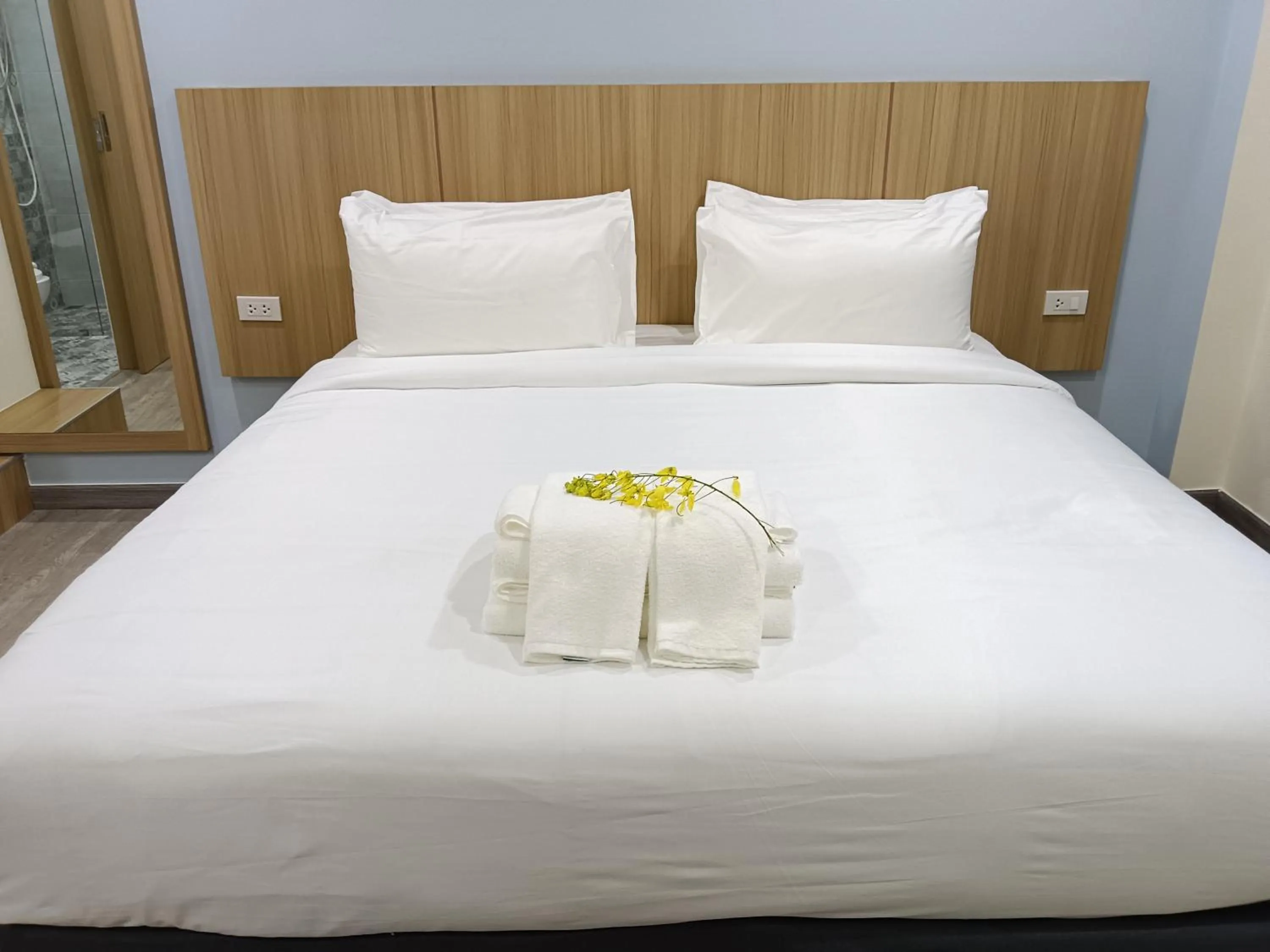 Bed in Beyond 21 Hotel